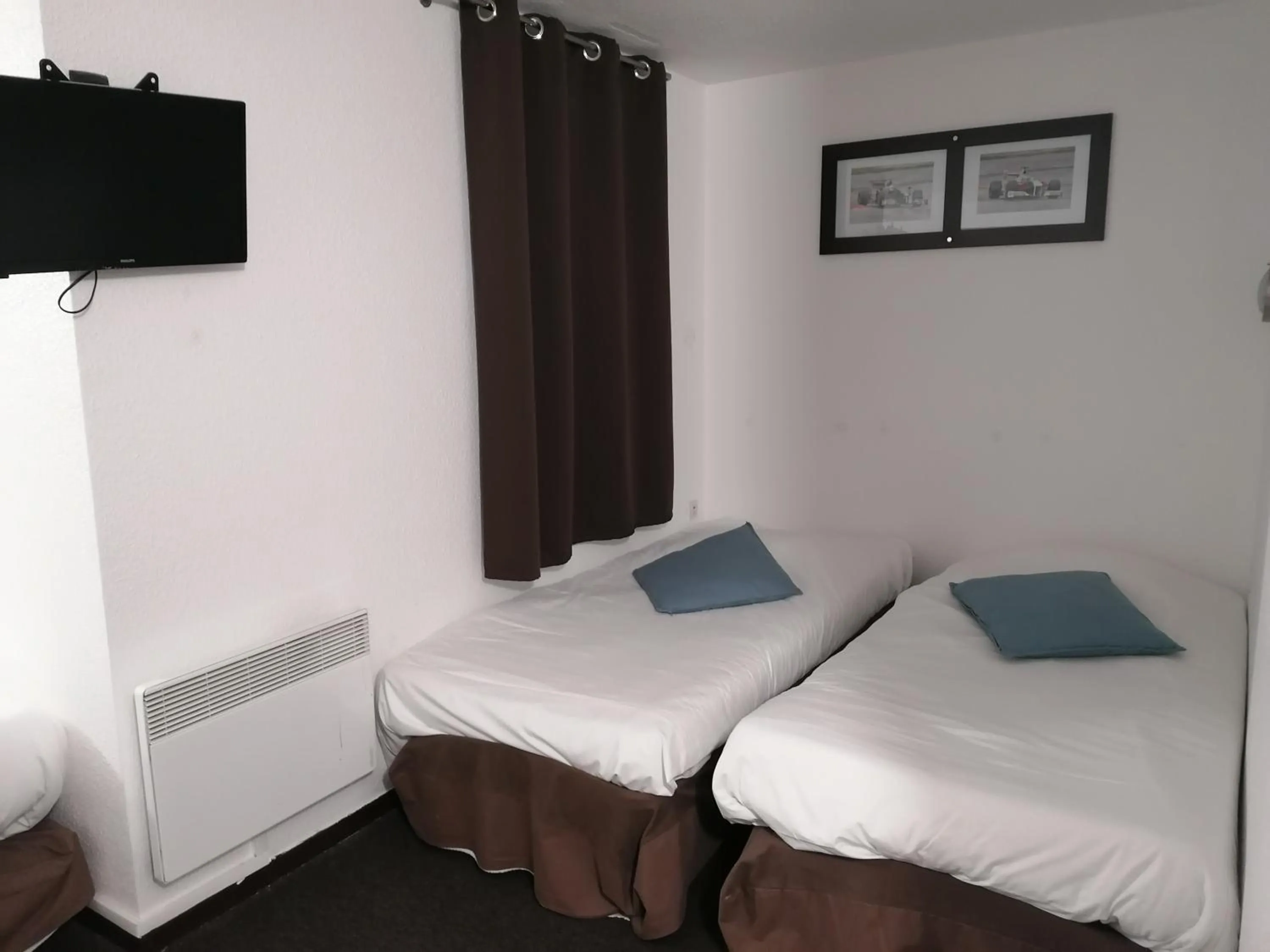 Bed in Enzo Hotels Vierzon by Kyriad Direct