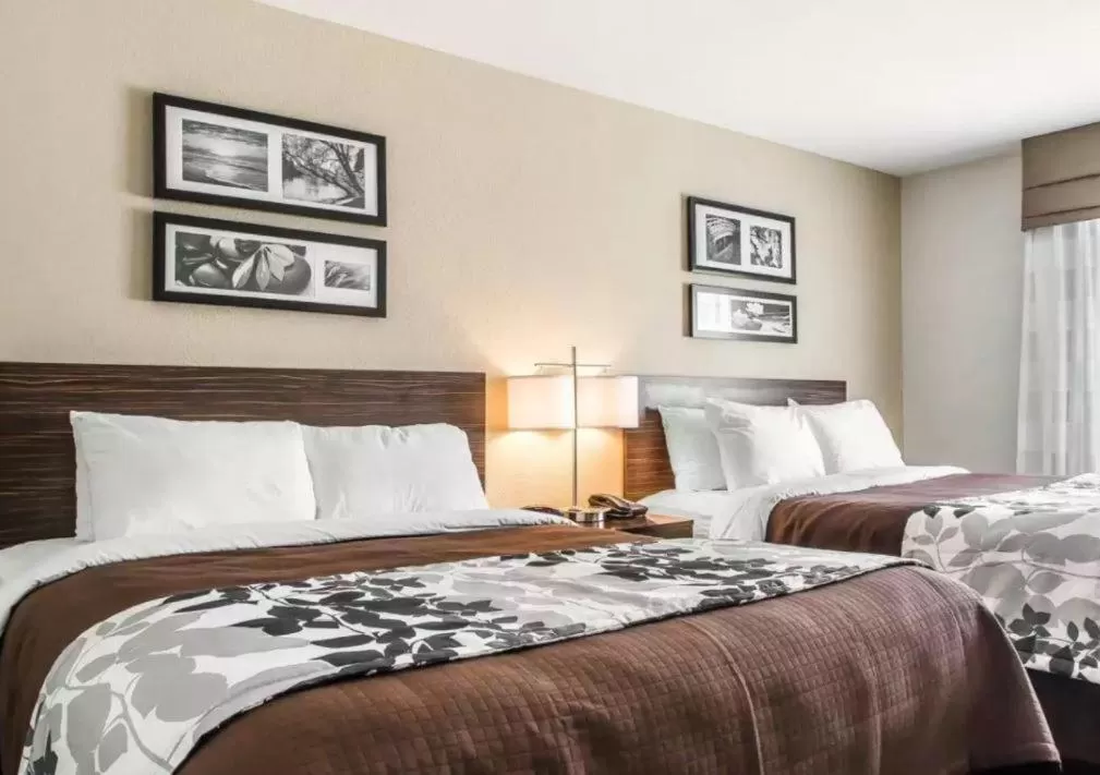 Bed in Sleep Inn & Suites Hannibal West