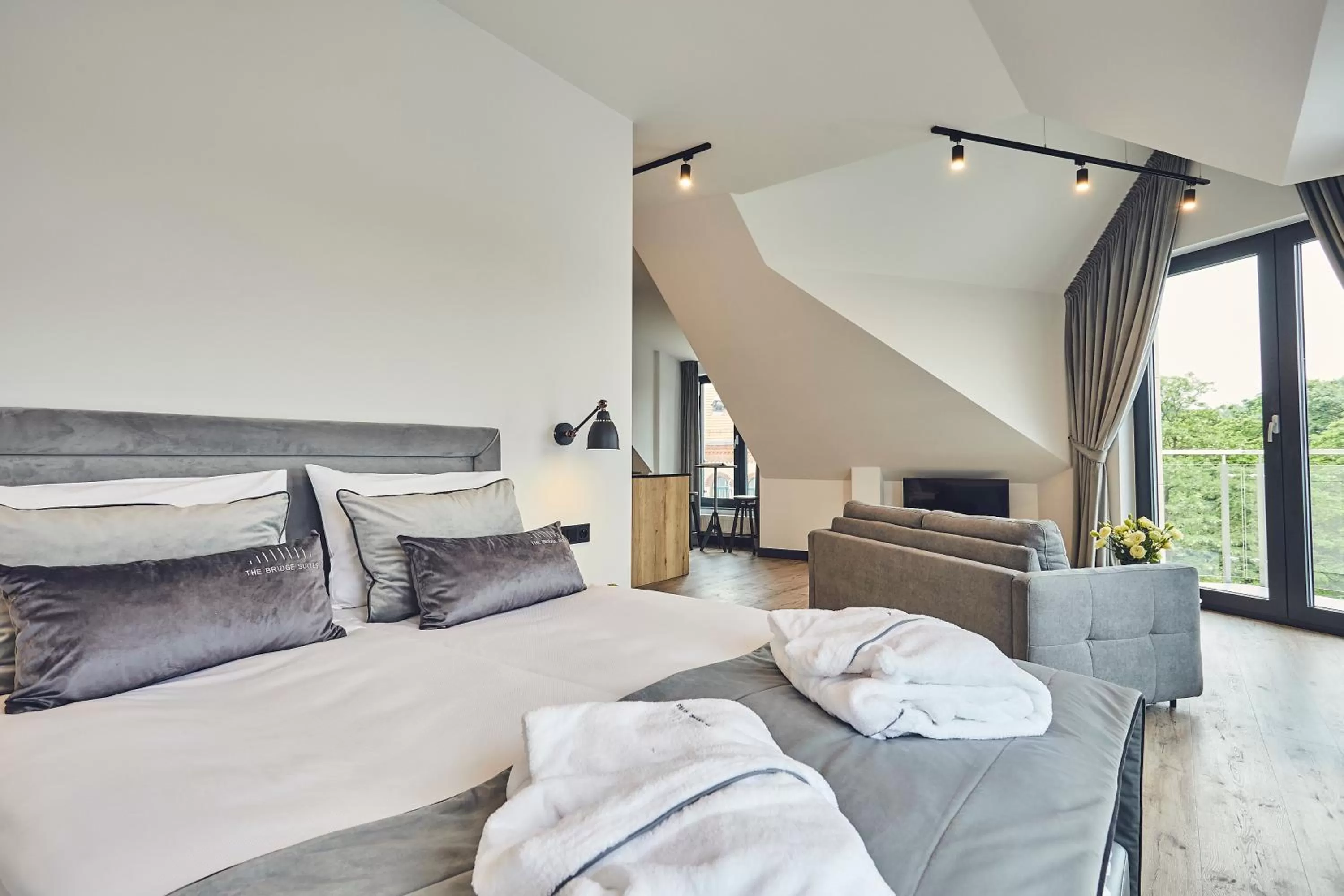 Photo of the whole room, Bed in The Bridge Suites Hotel