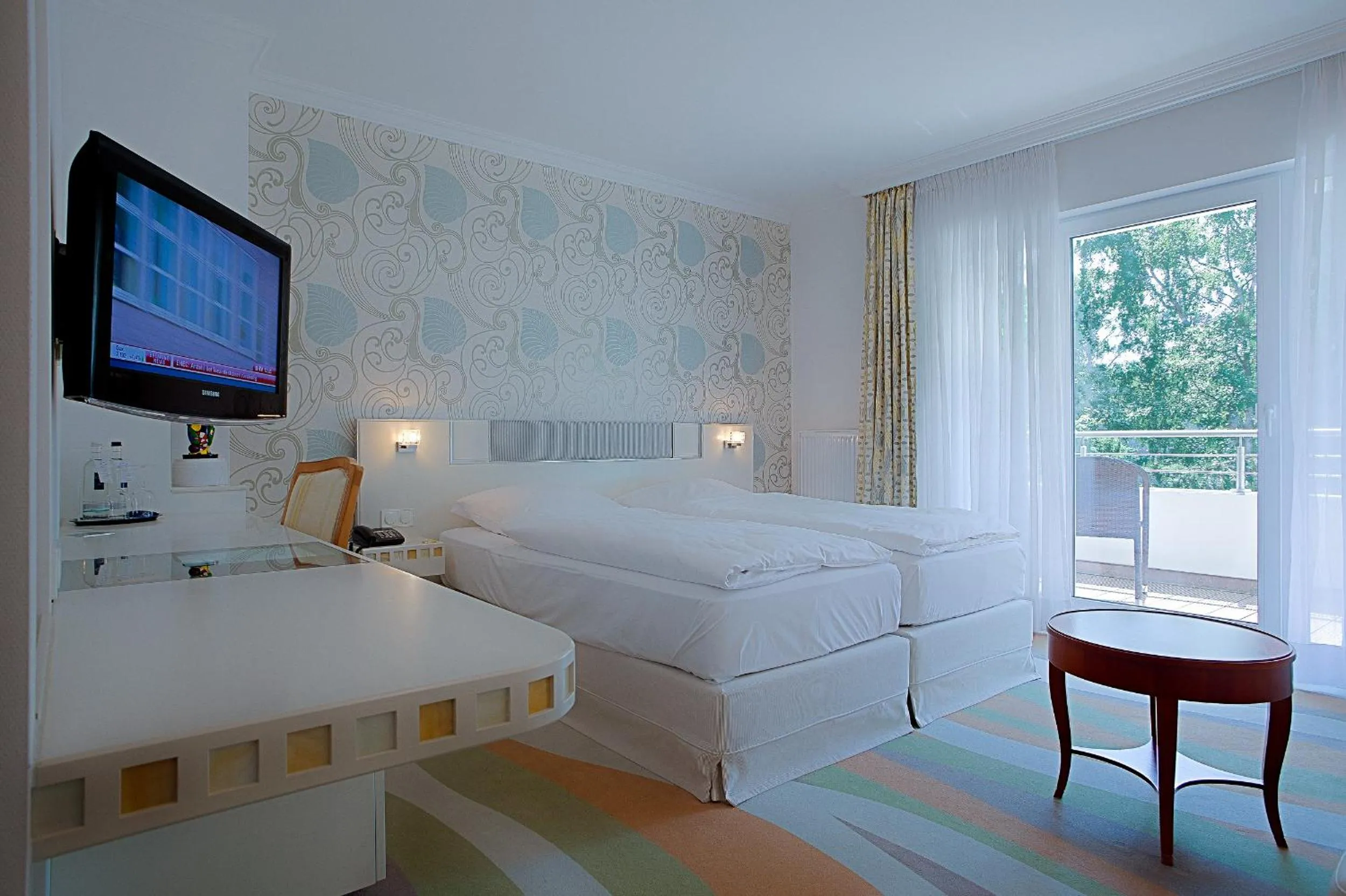 Photo of the whole room, Bed in Ringhotel Strandblick