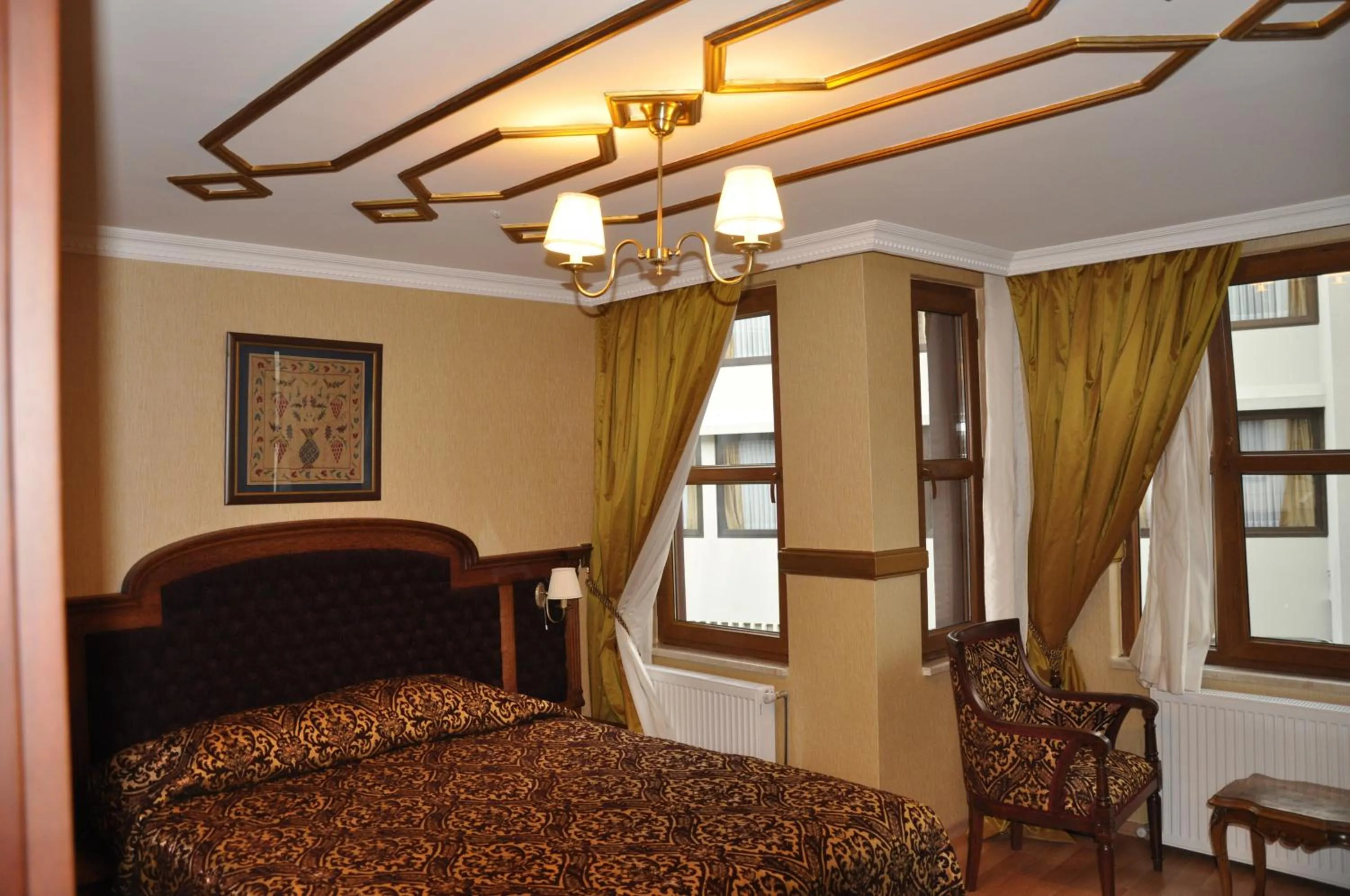 Bed in Aruna Boutique Hotel