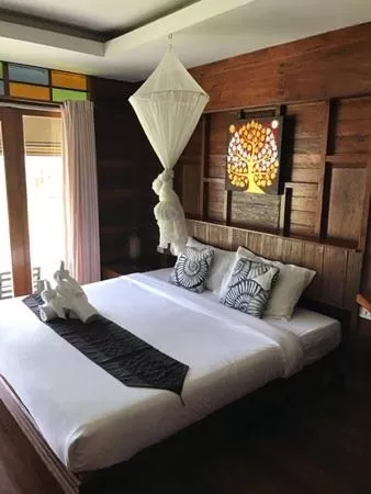 Bedroom, Bed in Thanya Beach Resort - SHA Plus