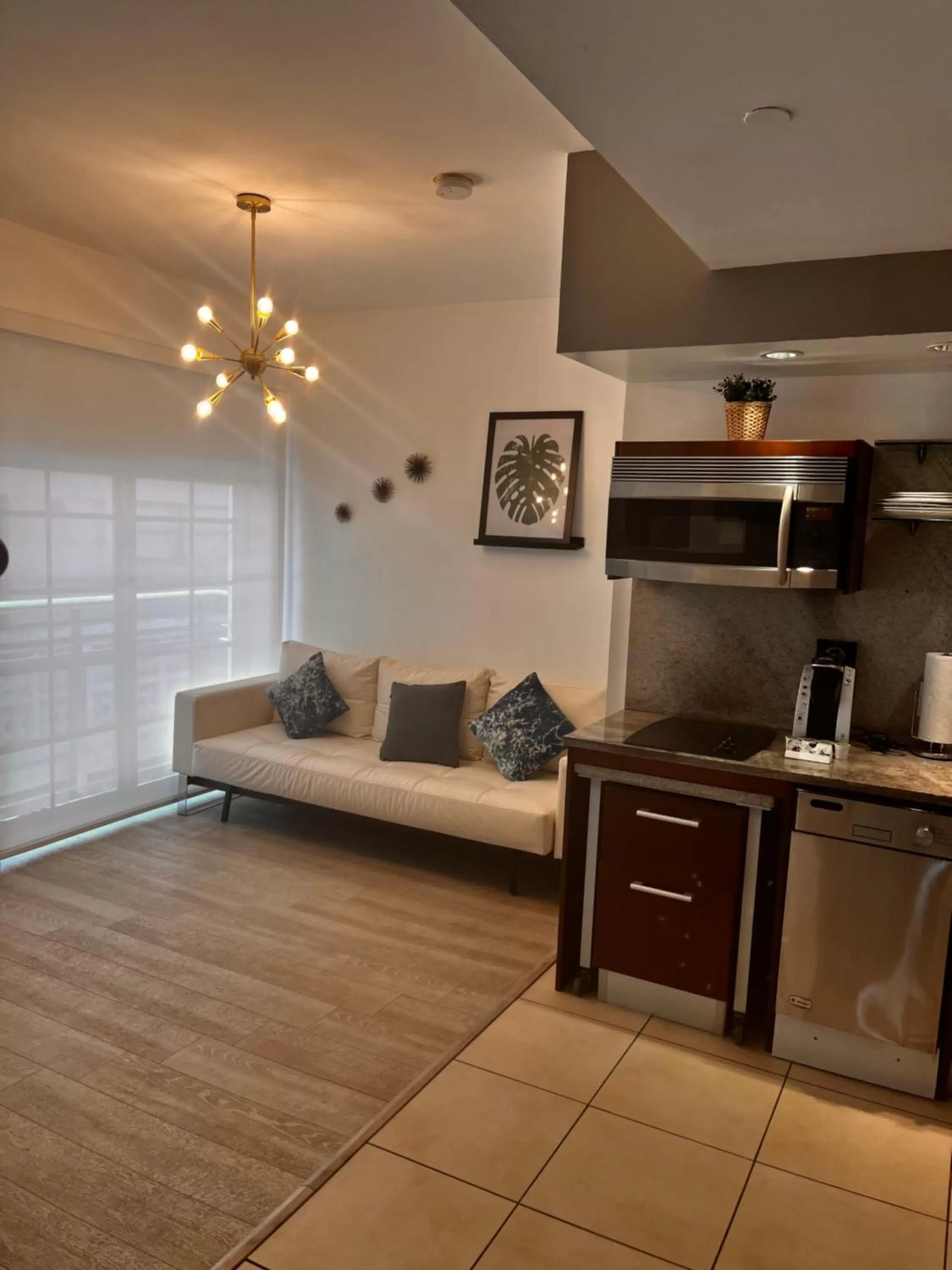 Living room, Kitchen/Kitchenette in Suites at The Strand on Ocean Drive