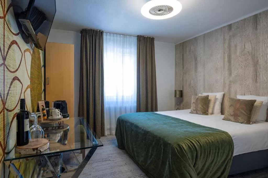 Bed in Boutique Hotel Slenaker Vallei - Buitengewoongenieten