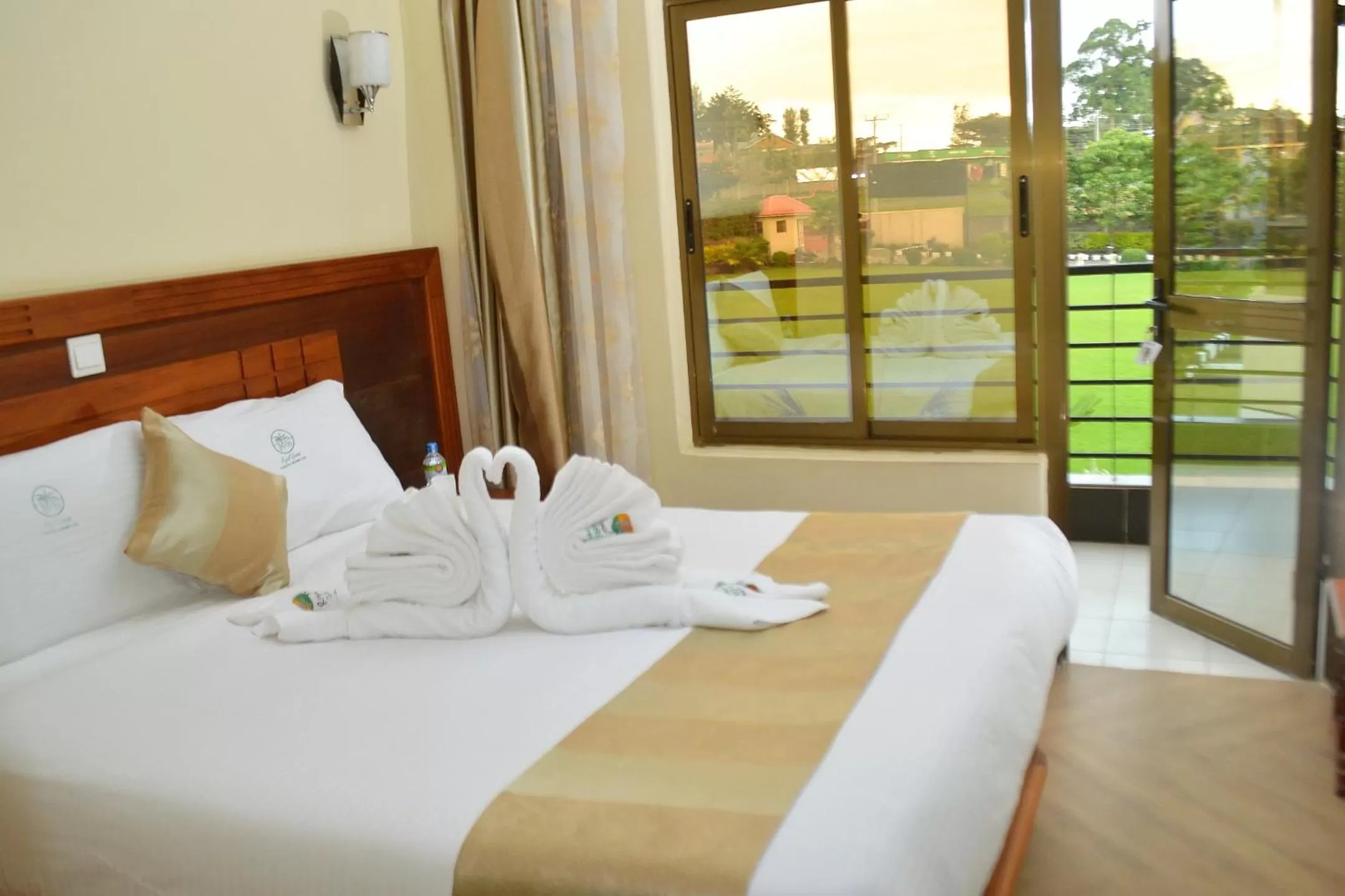 Balcony/Terrace, Bed in Royal Green Gardens Resort