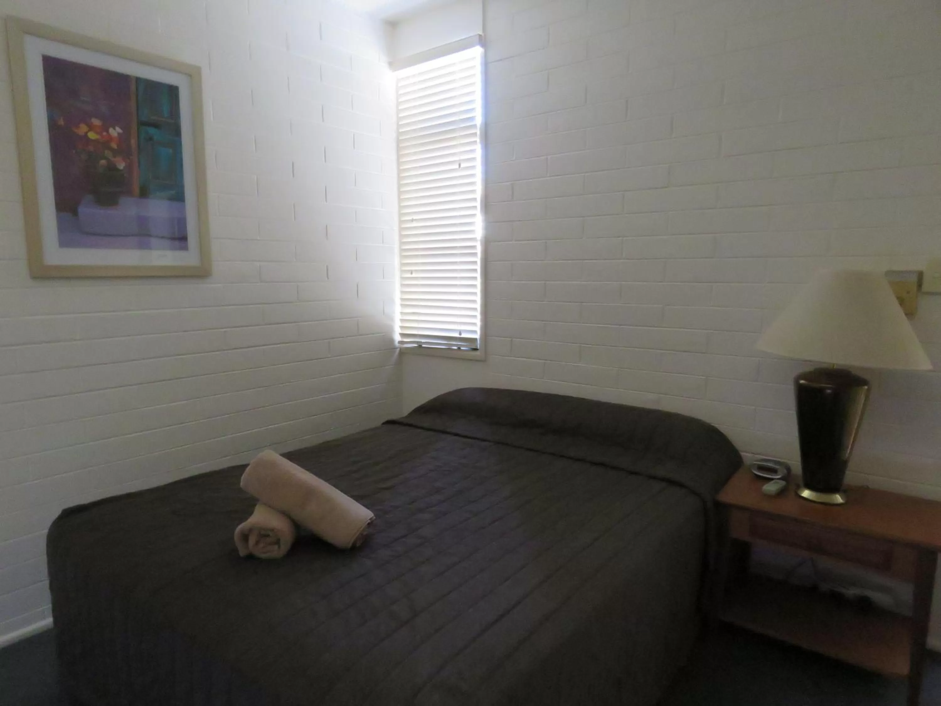 Bed in Emerald Gardens Motel & Apartments