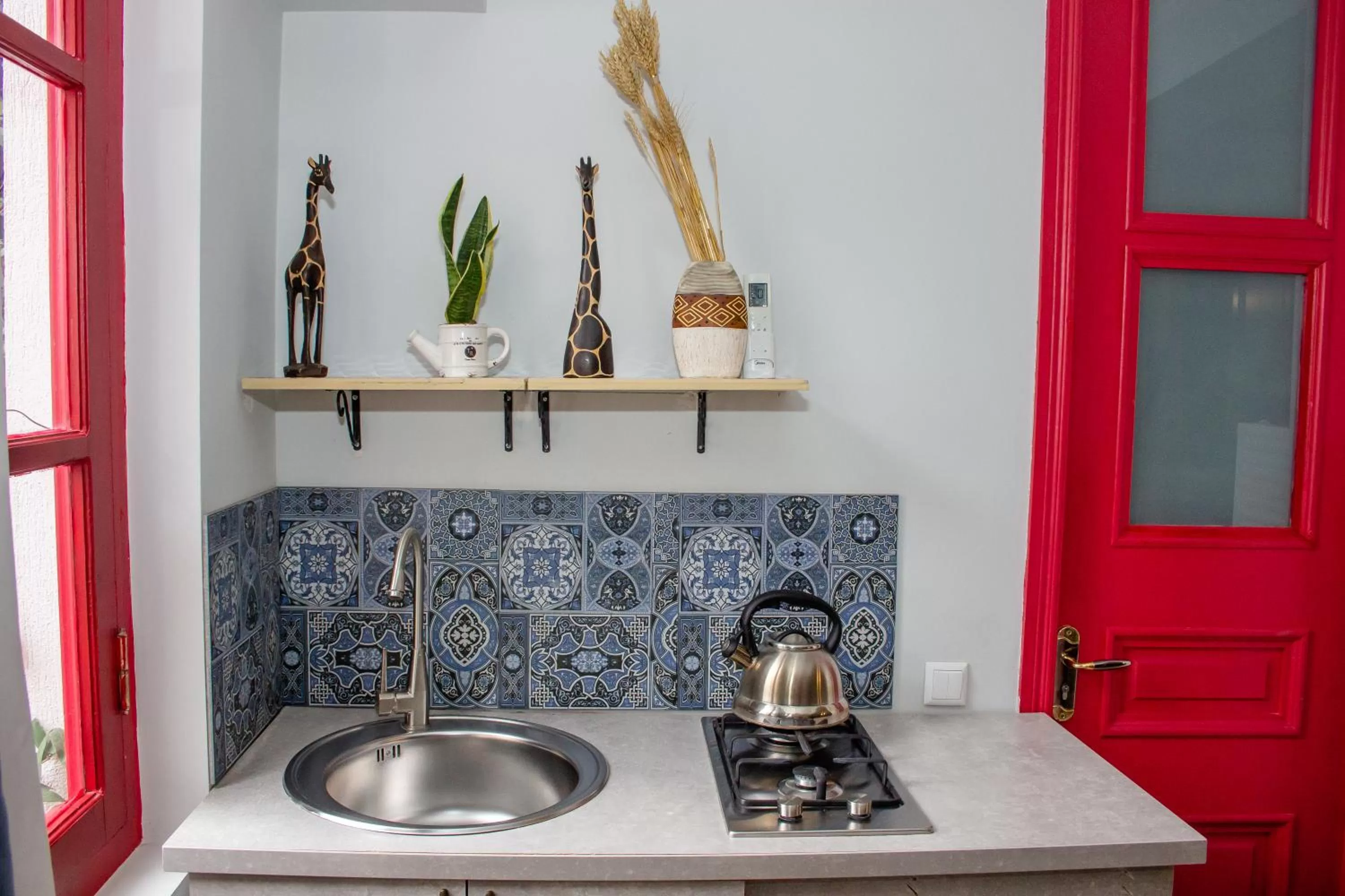 Kitchen or kitchenette in Check Point Hotel