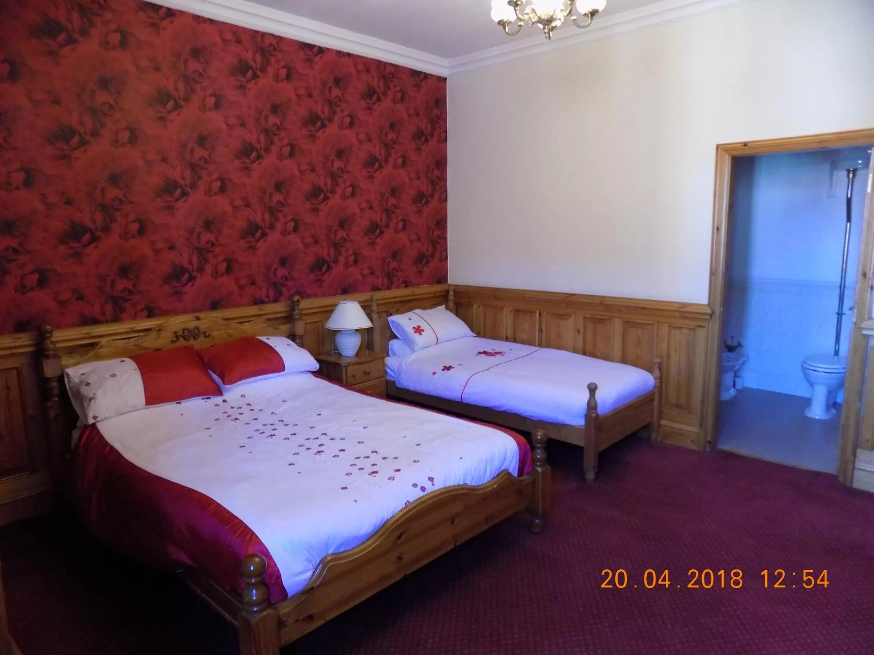 Bed in The Londesborough Arms bar with en-suite rooms