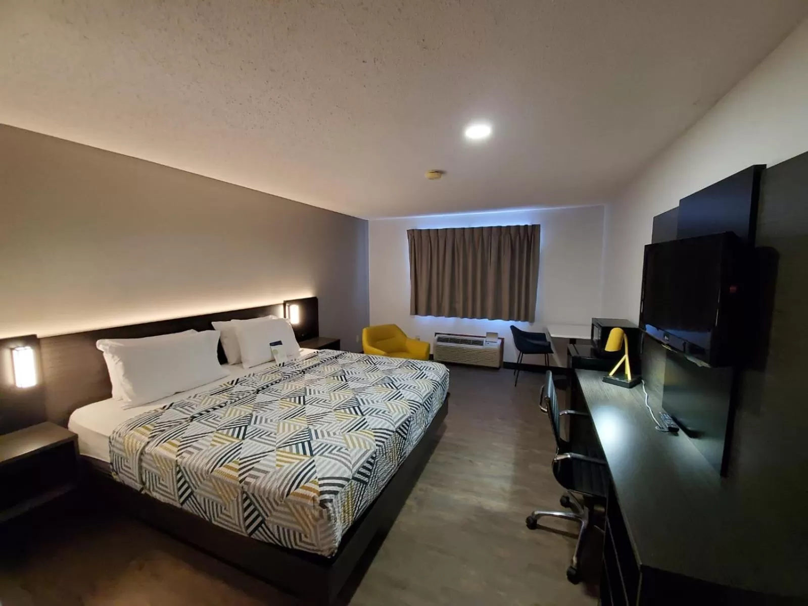 Bed in Motel 6-Kewanee, IL