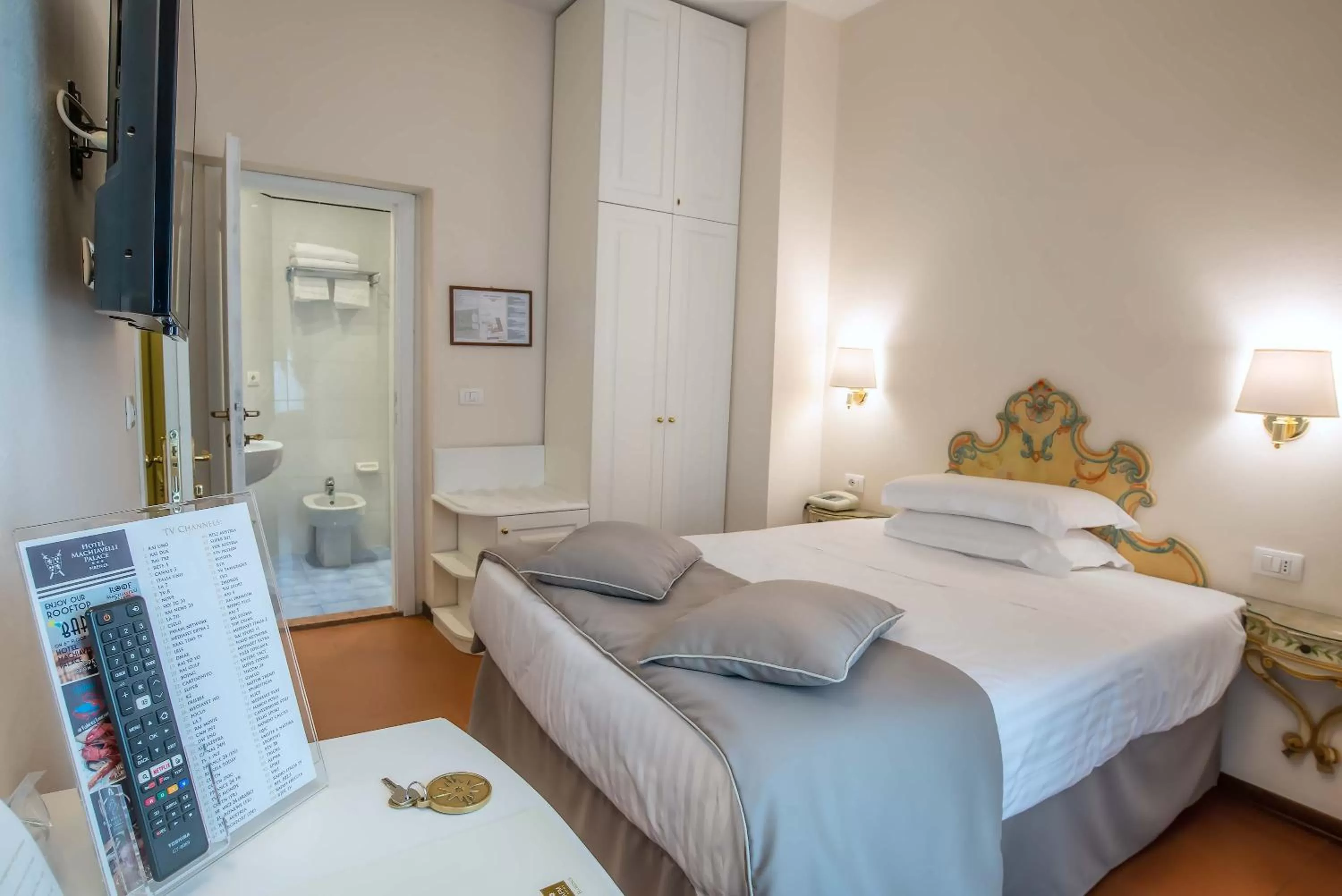 Bed in Hotel Machiavelli Palace