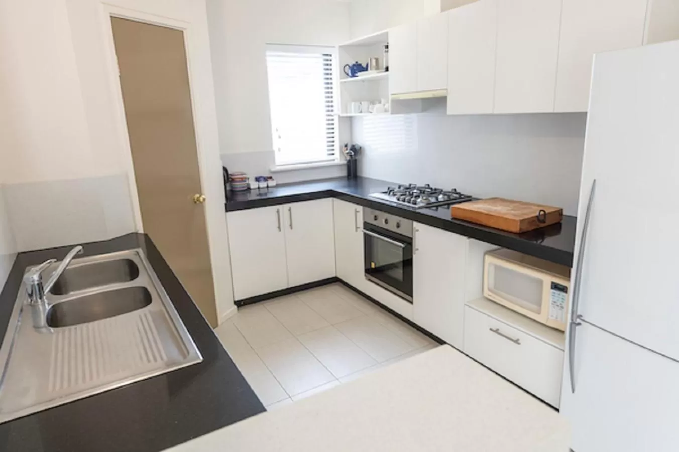 Kitchen or kitchenette in Margarets Beach Resort