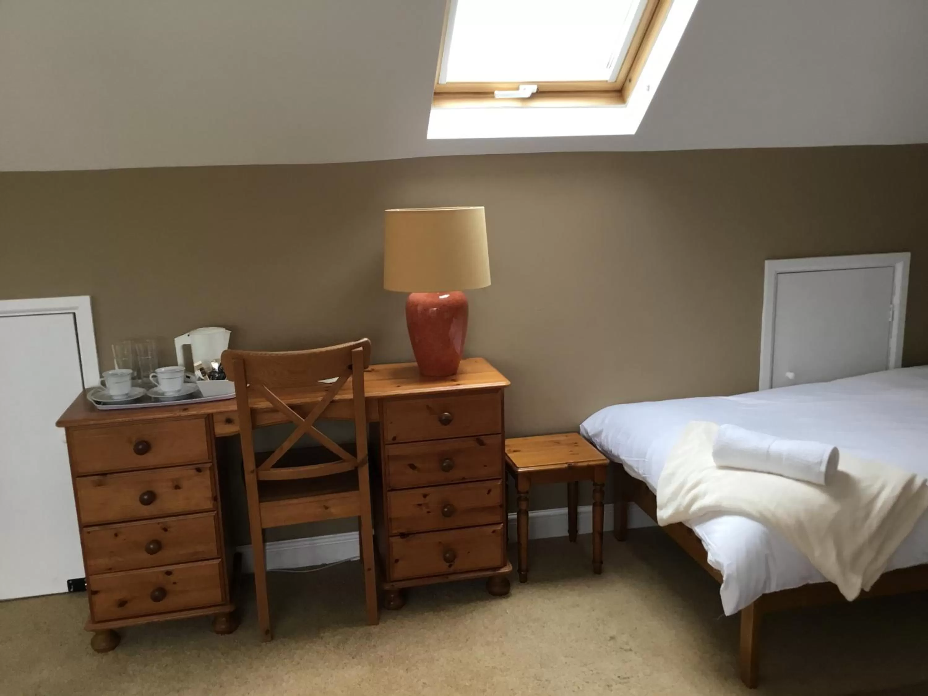 Bed in TRETHEWEY GUEST HOUSE