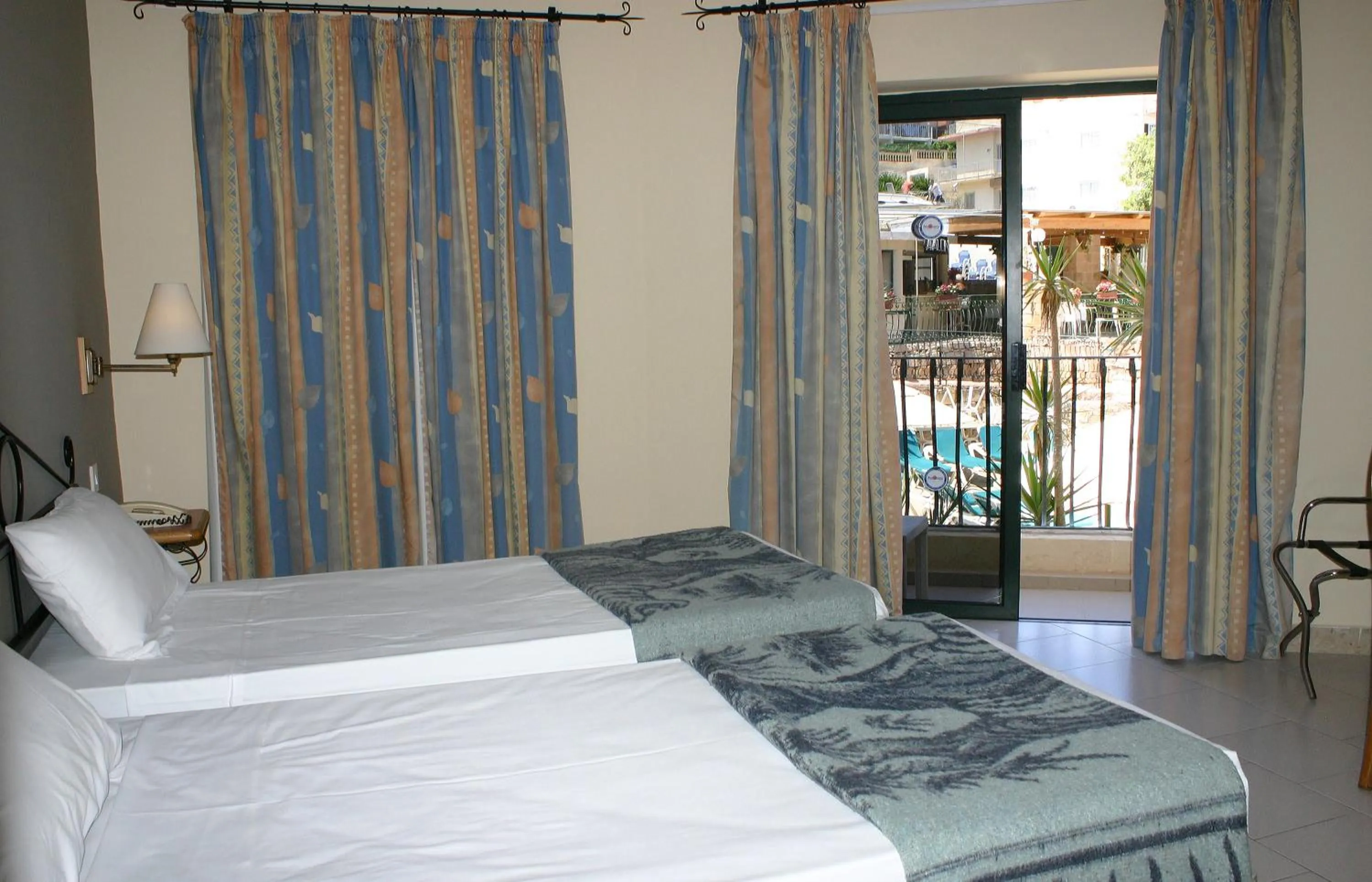 Bed in Porto Azzurro Aparthotel