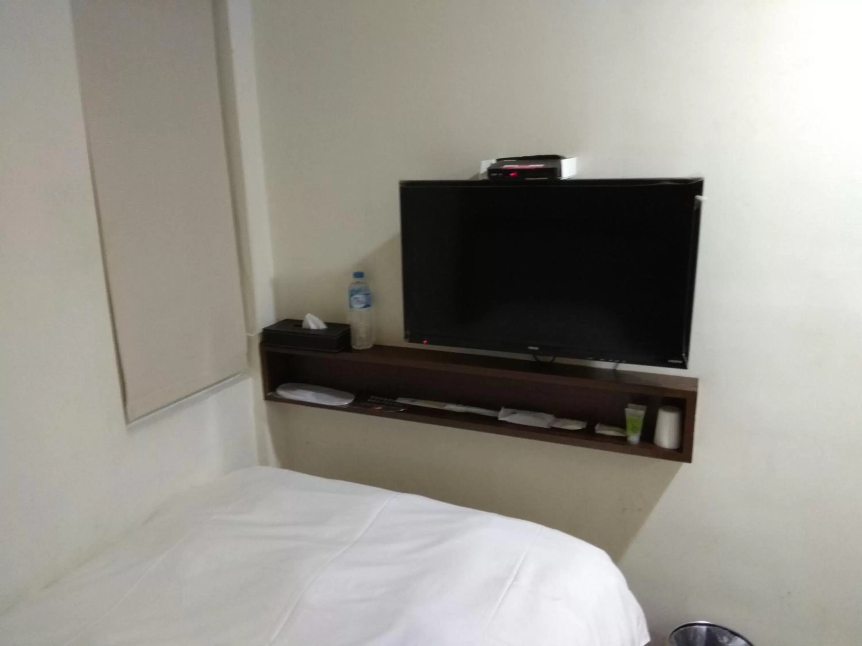 Bed in 德瑞旅店Direct Hotel