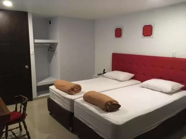 Bed in Hotel Garden City Boutique