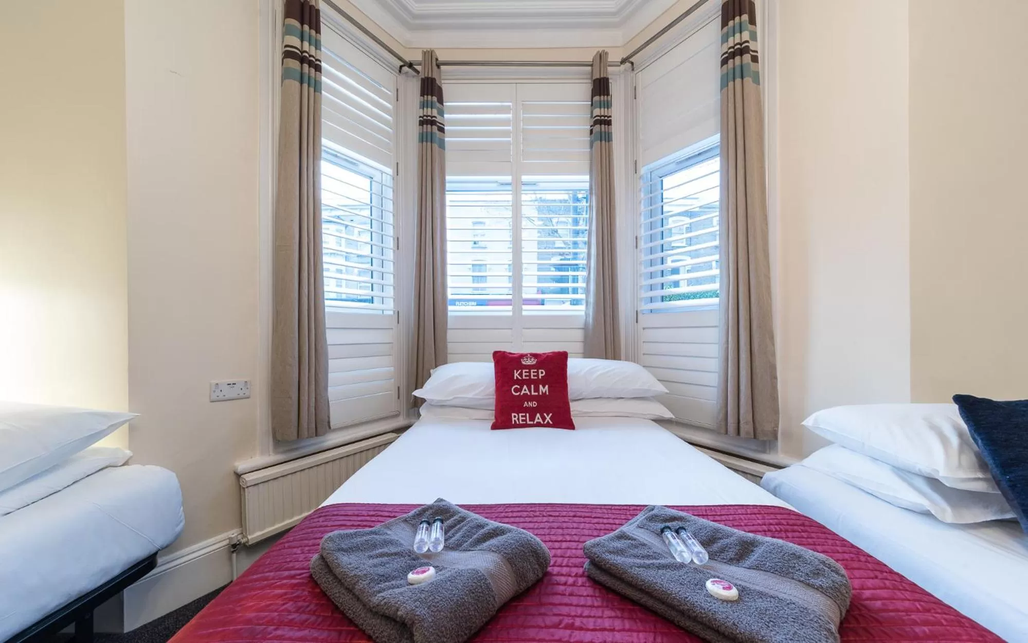 Bed in Hellenic Hotel by Saba