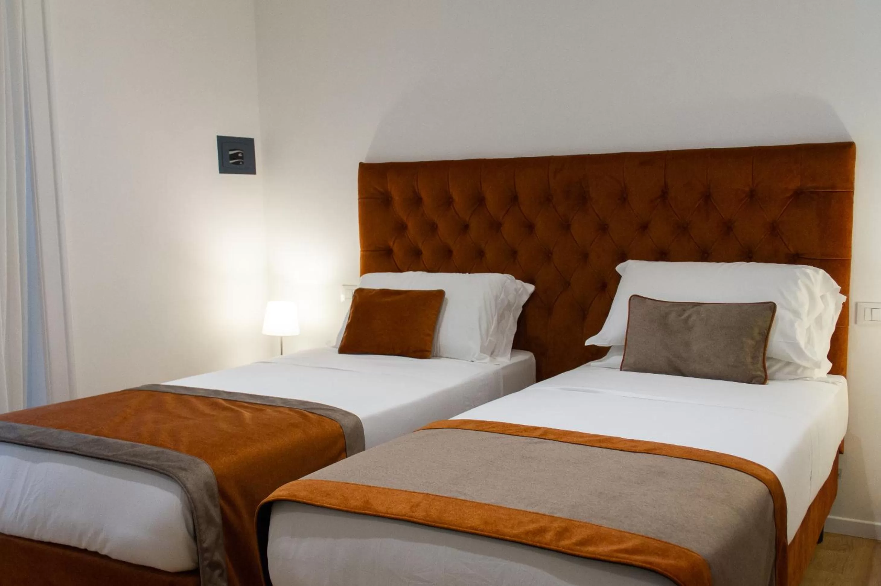 Bed in Michelangelo Vatican Rooms