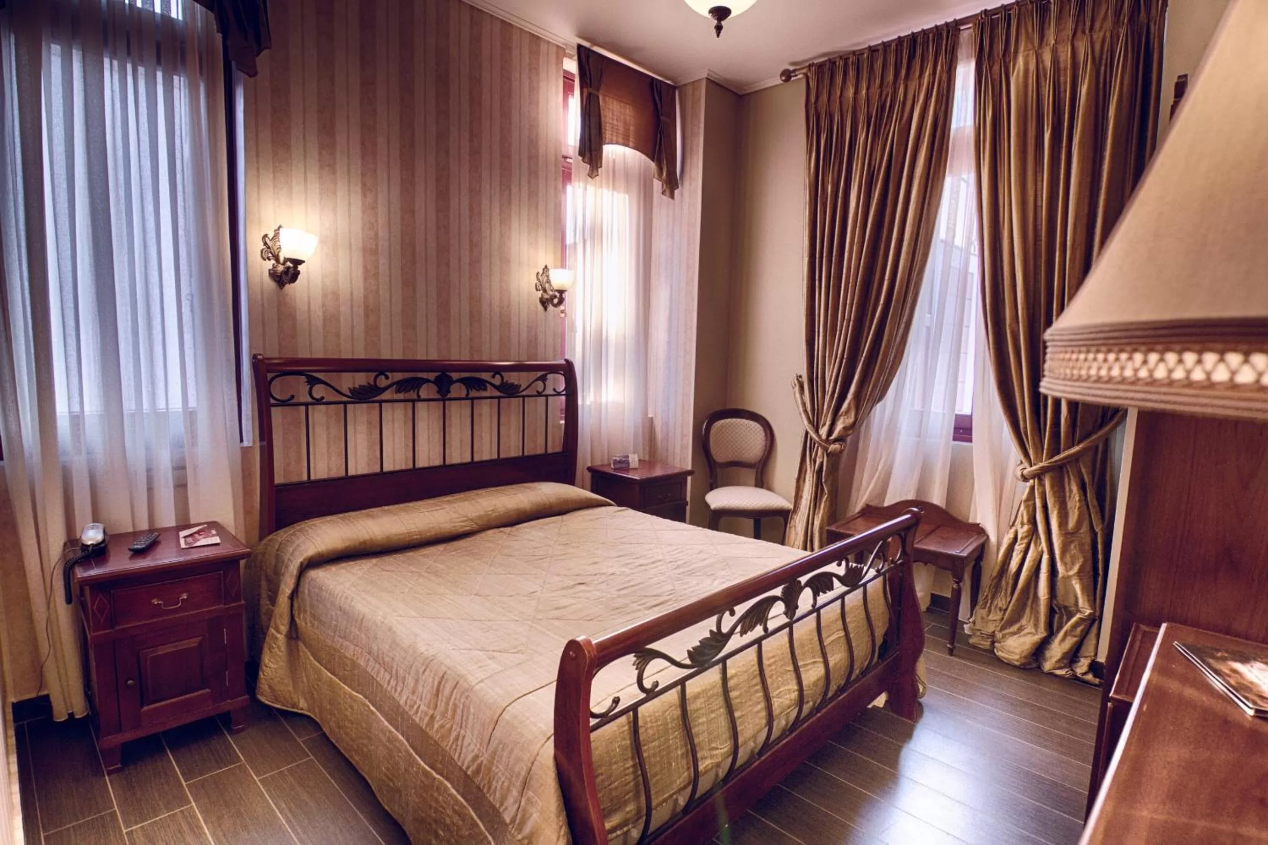 Bed in Theofilos Paradise Boutique Hotel
