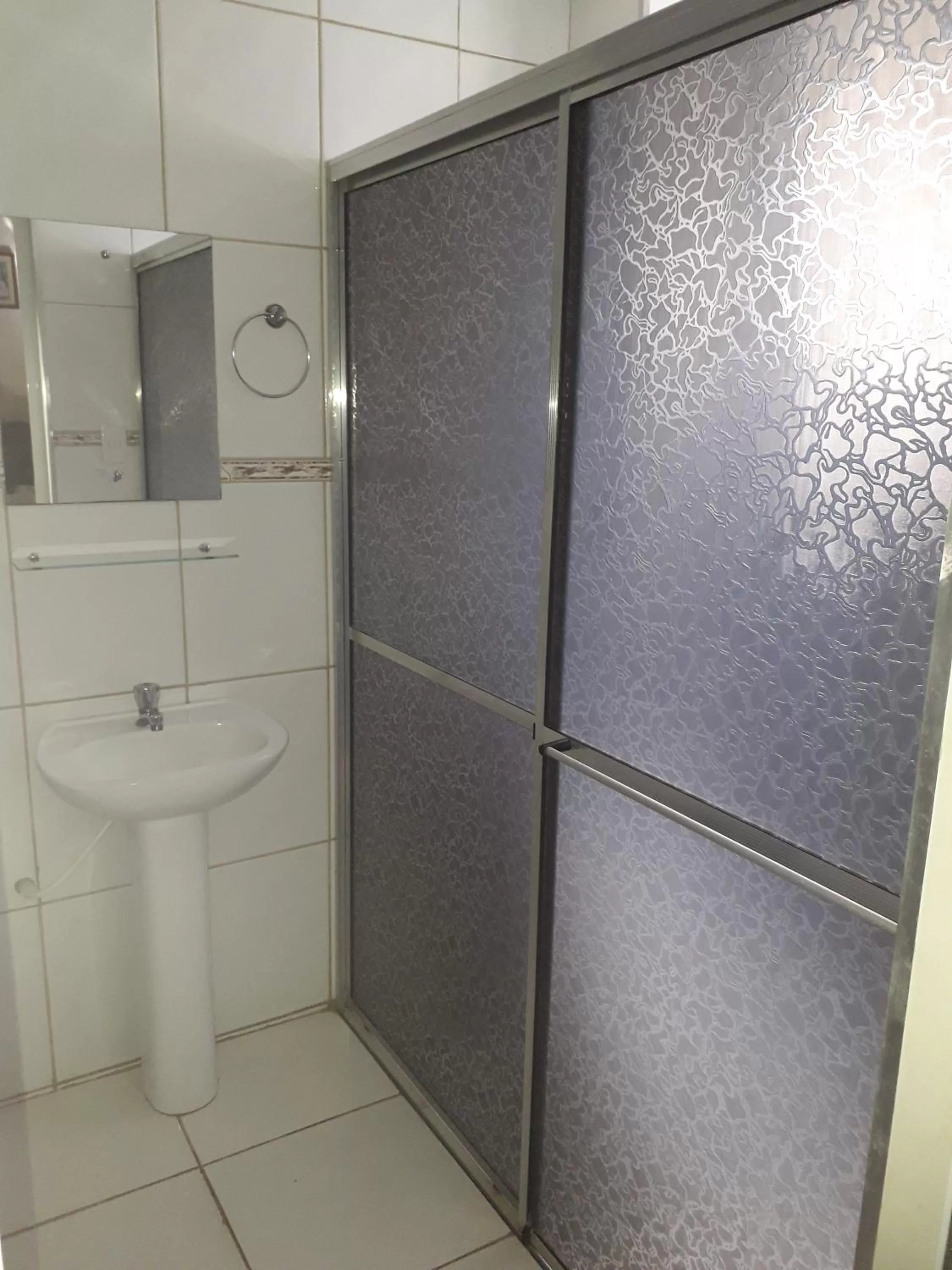 Bathroom in Hotel Athenas e Convenções