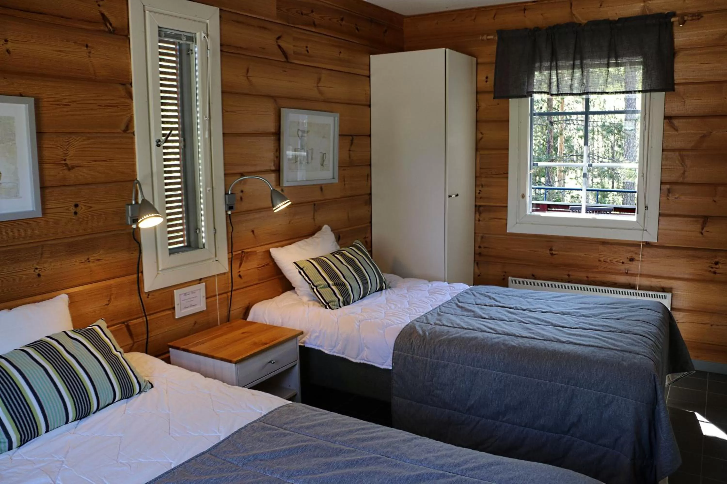 Bed in Rauhalahti Holiday Homes