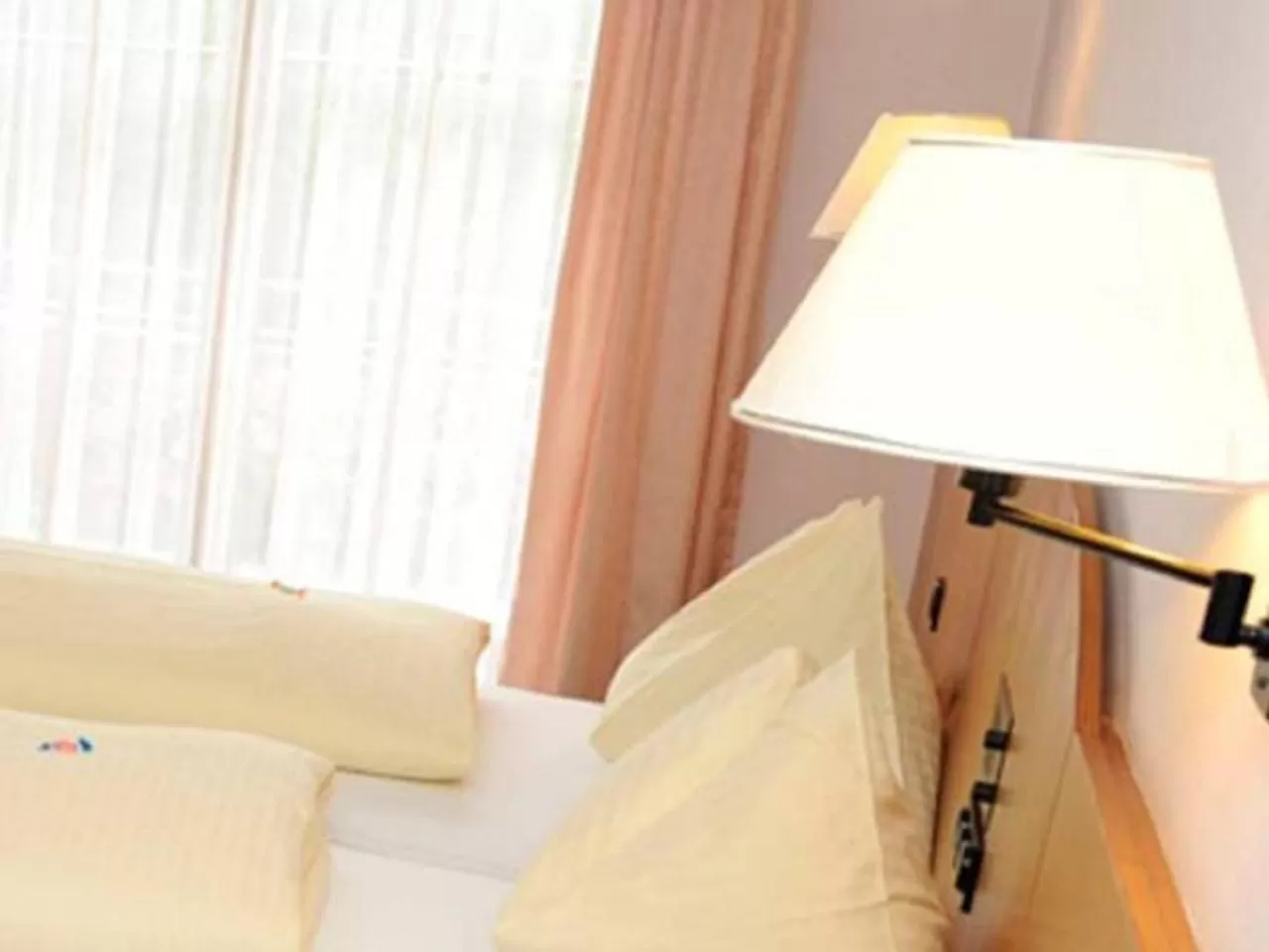 Bed in Hotel Edlingerwirt - Sauna & Golfsimulator inklusive