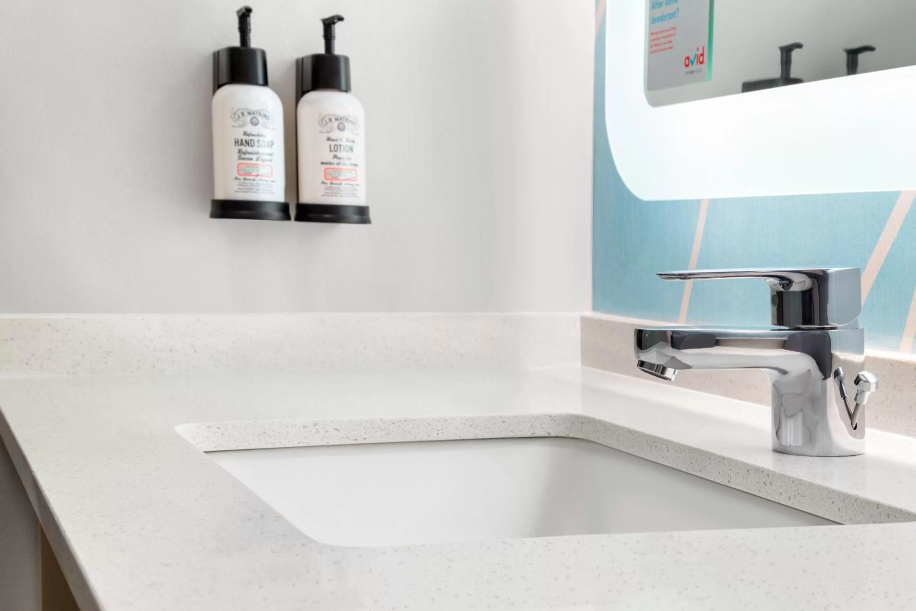 Bathroom in Avid Hotels - Denver Airport Area by IHG