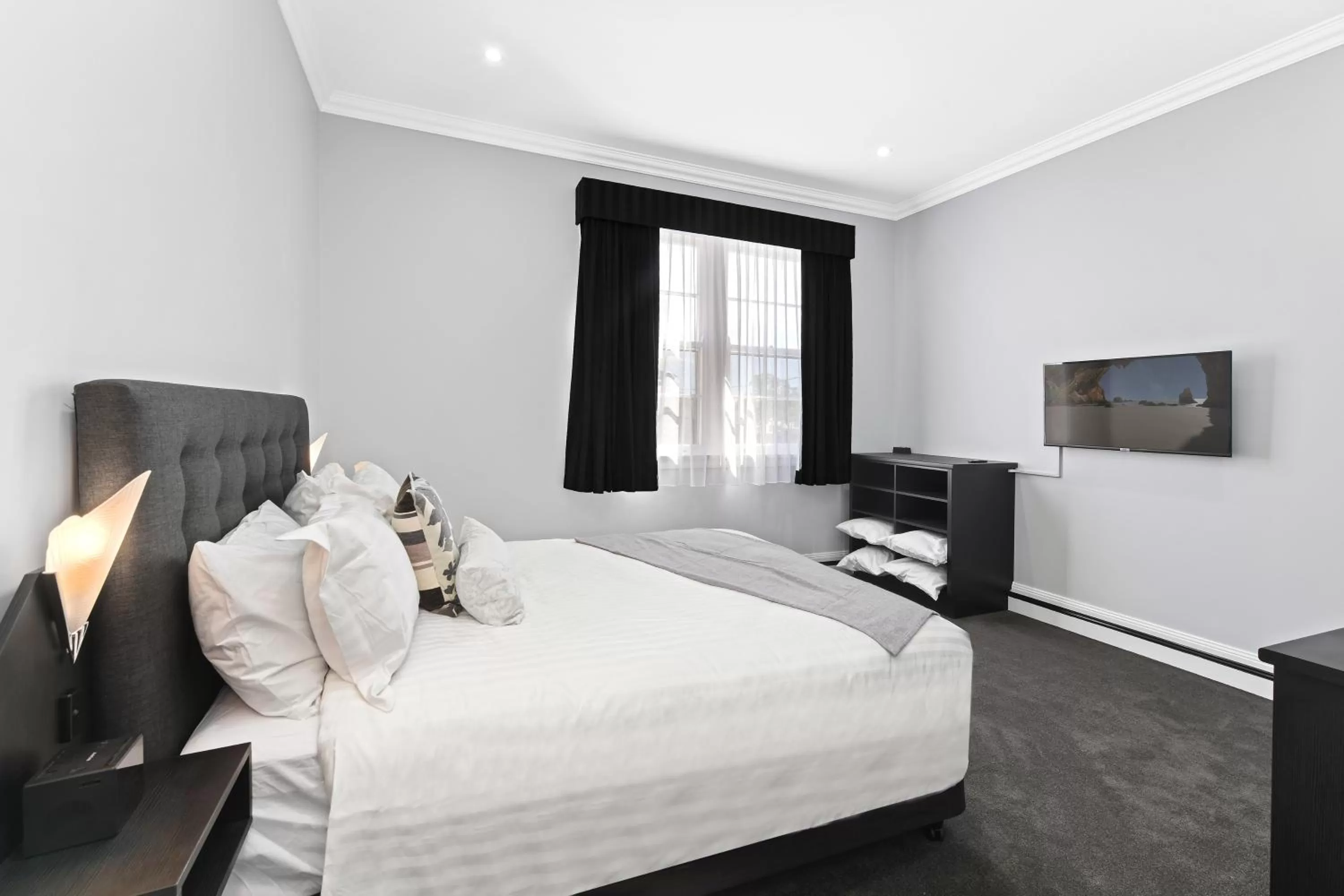 Bed in The Star Boutique Apartments