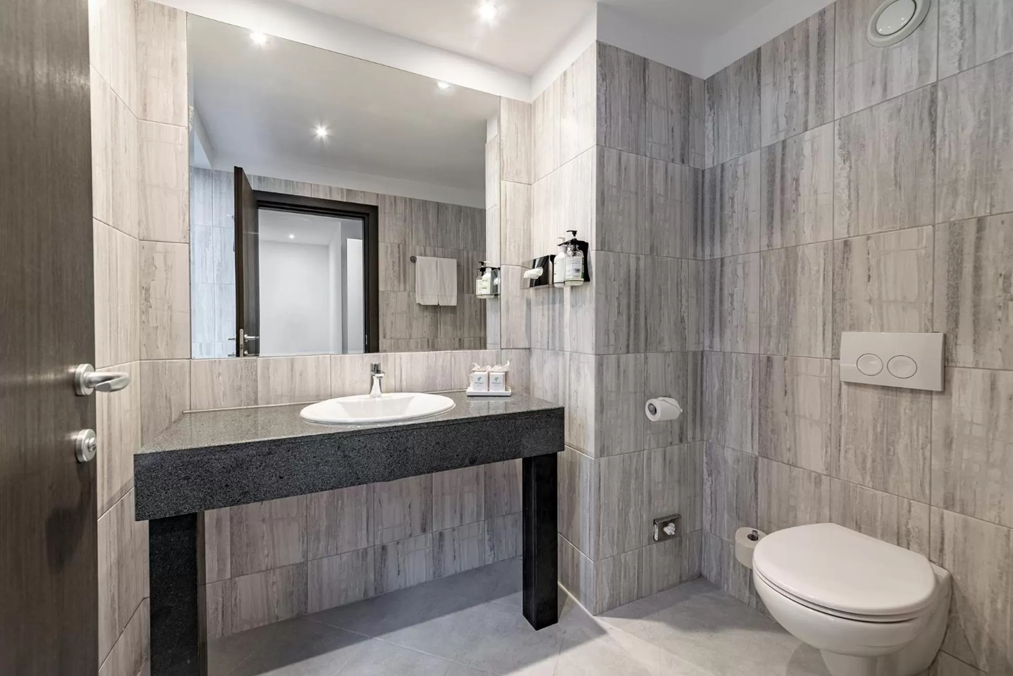 Toilet in Holiday Inn Bucharest - Times by IHG