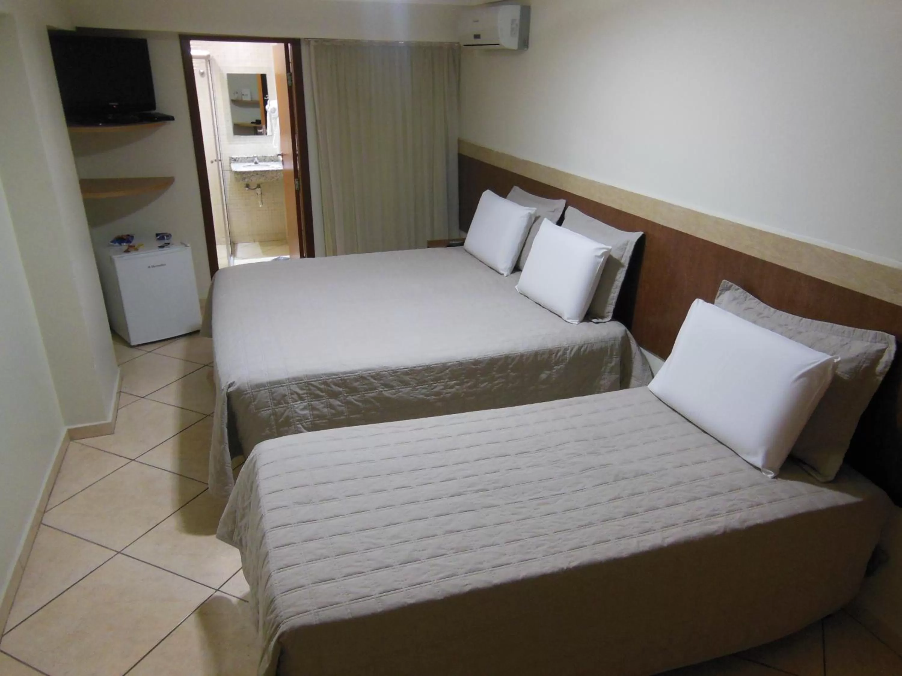 Bed in Alfa Plaza Hotel