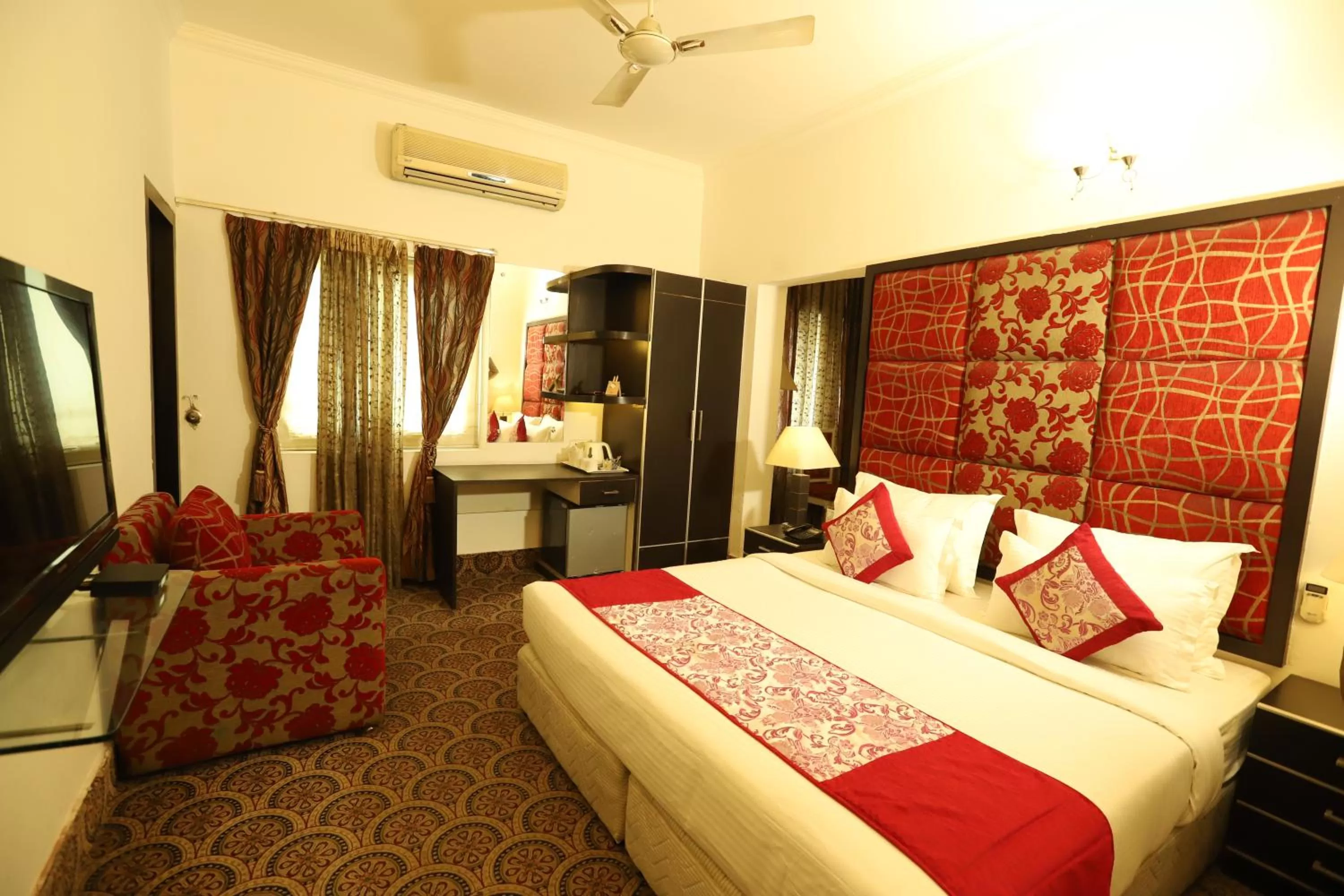 Photo of the whole room in Hotel Capitol Hills - Greater Kailash Delhi
