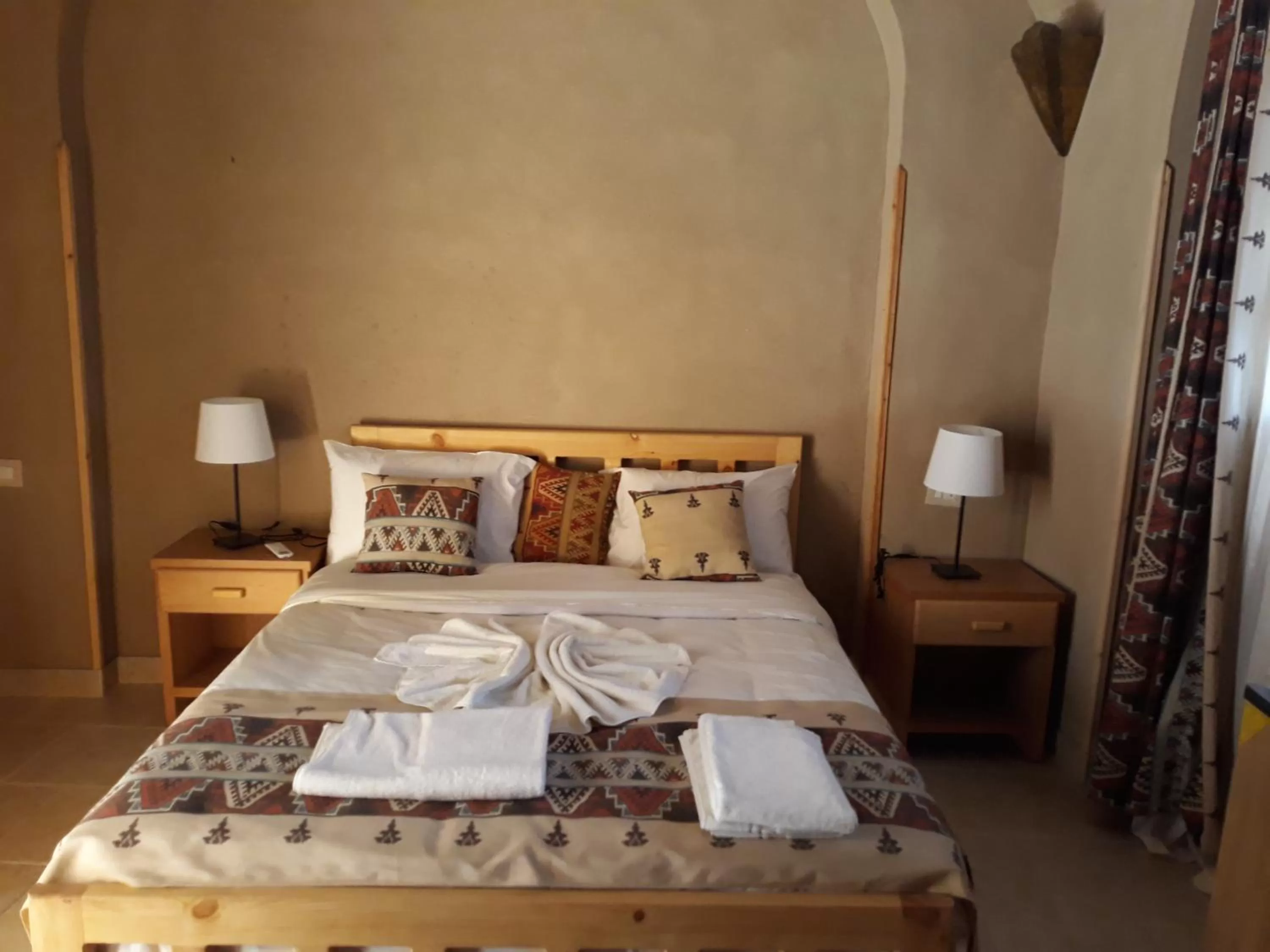 Bed in Embrace Hotel