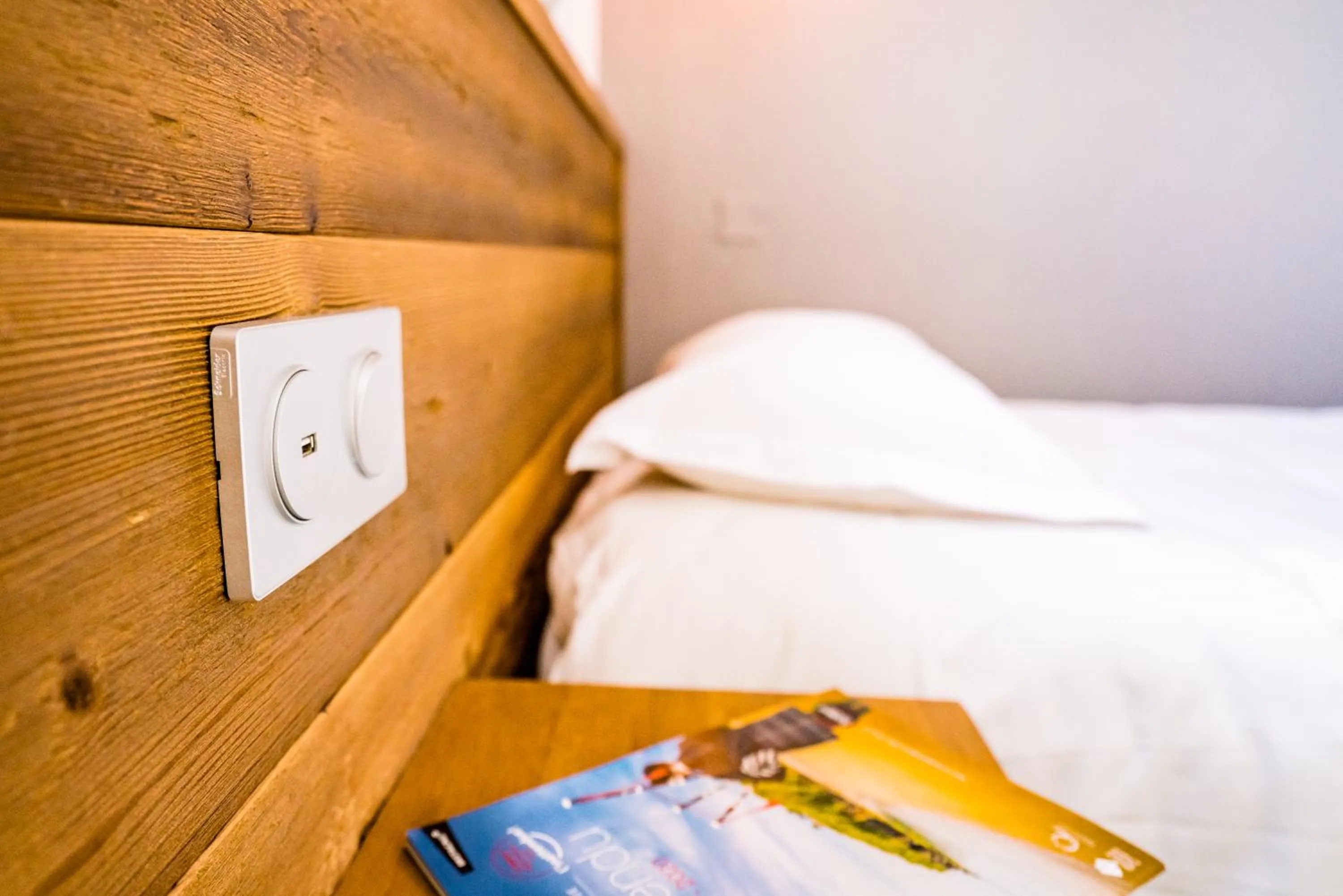 Bed in Hôtel Victor Hugo Lorient