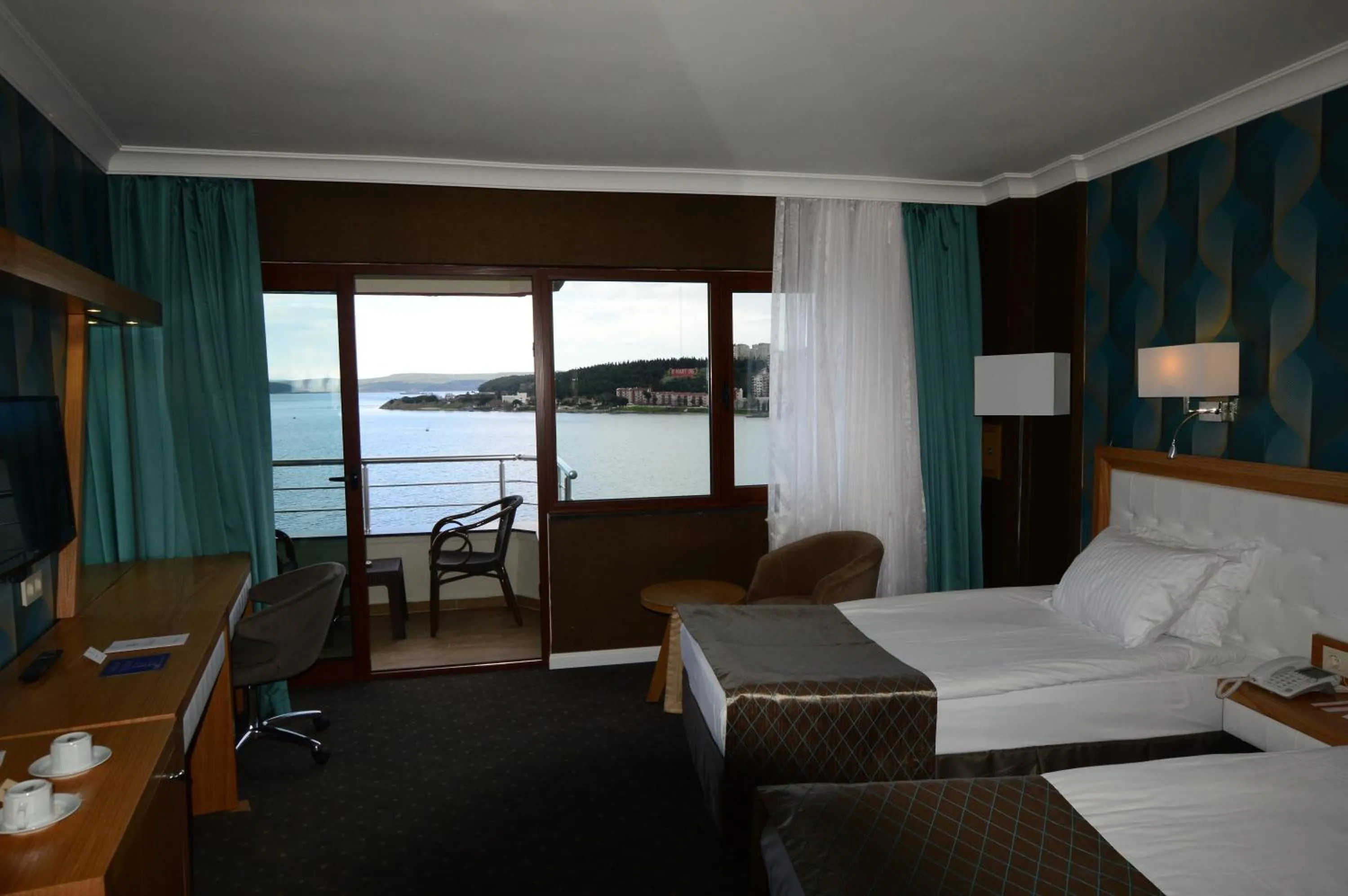 Photo of the whole room, Bed in Akol Hotel