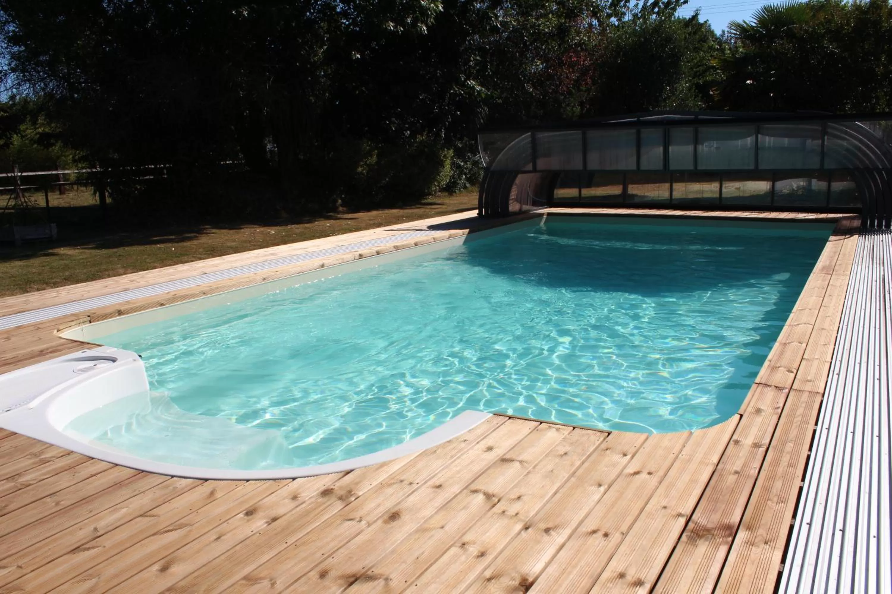 Swimming pool in Aux Agapanthes