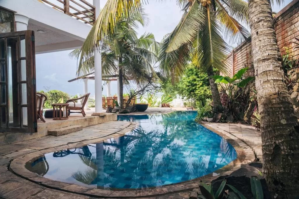 Swimming Pool in Sānti Beach House with pool & beach