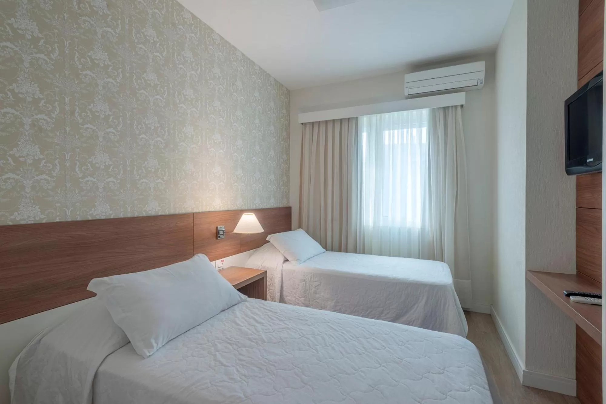 Bed in Hotel Glória