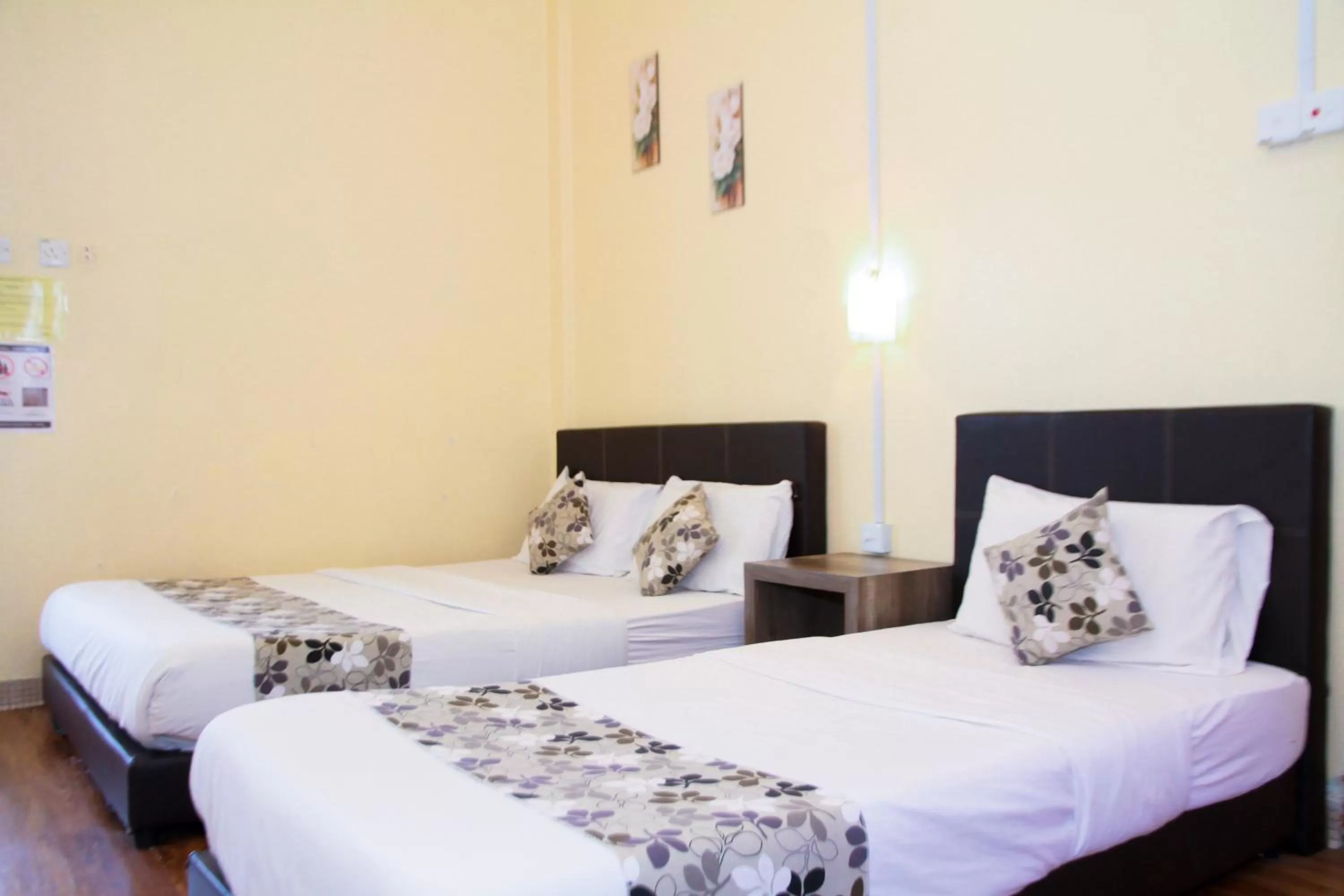 Bed in Myra Hotel Mersing