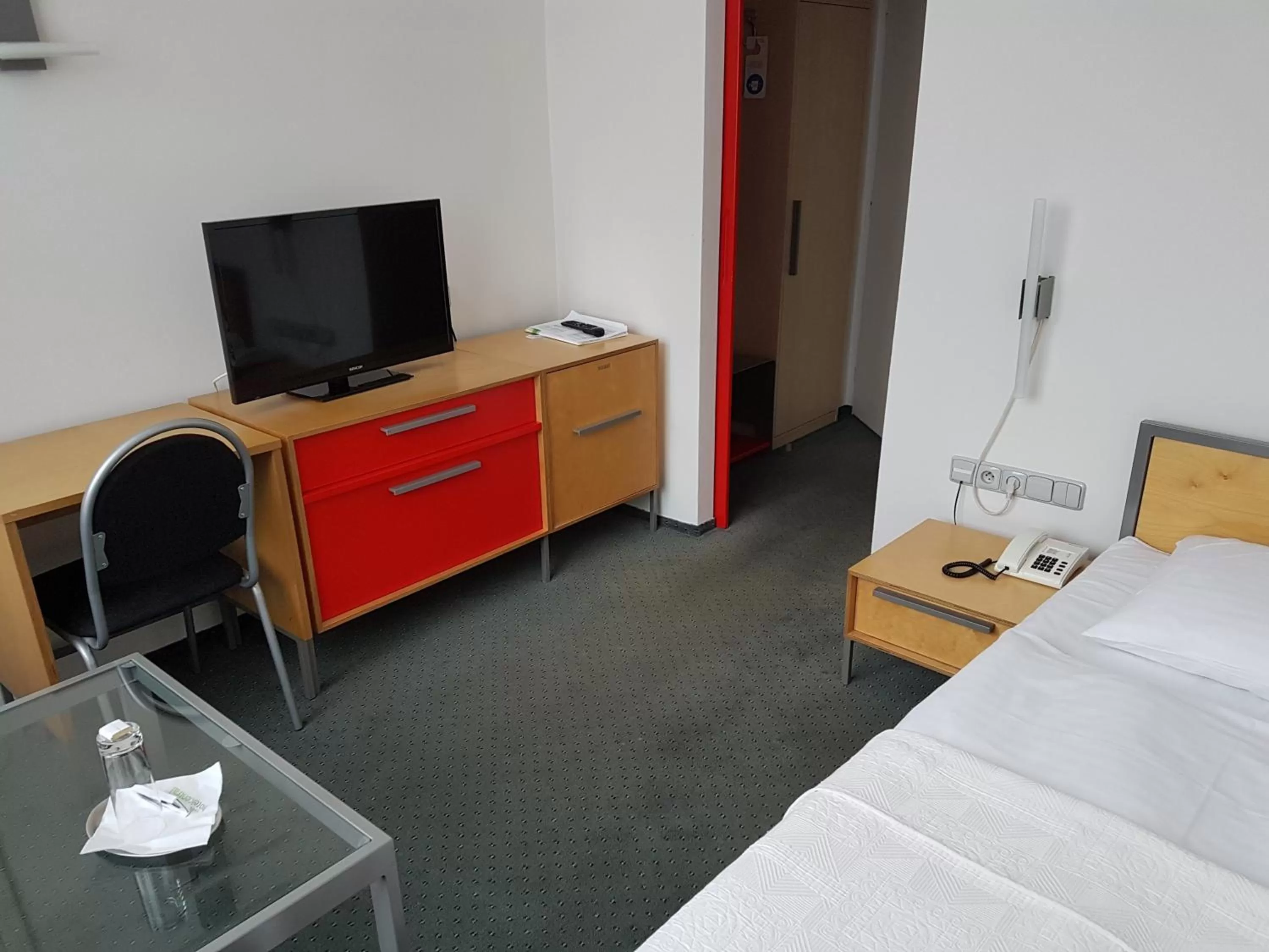 Living room, Bed in Hotel Central