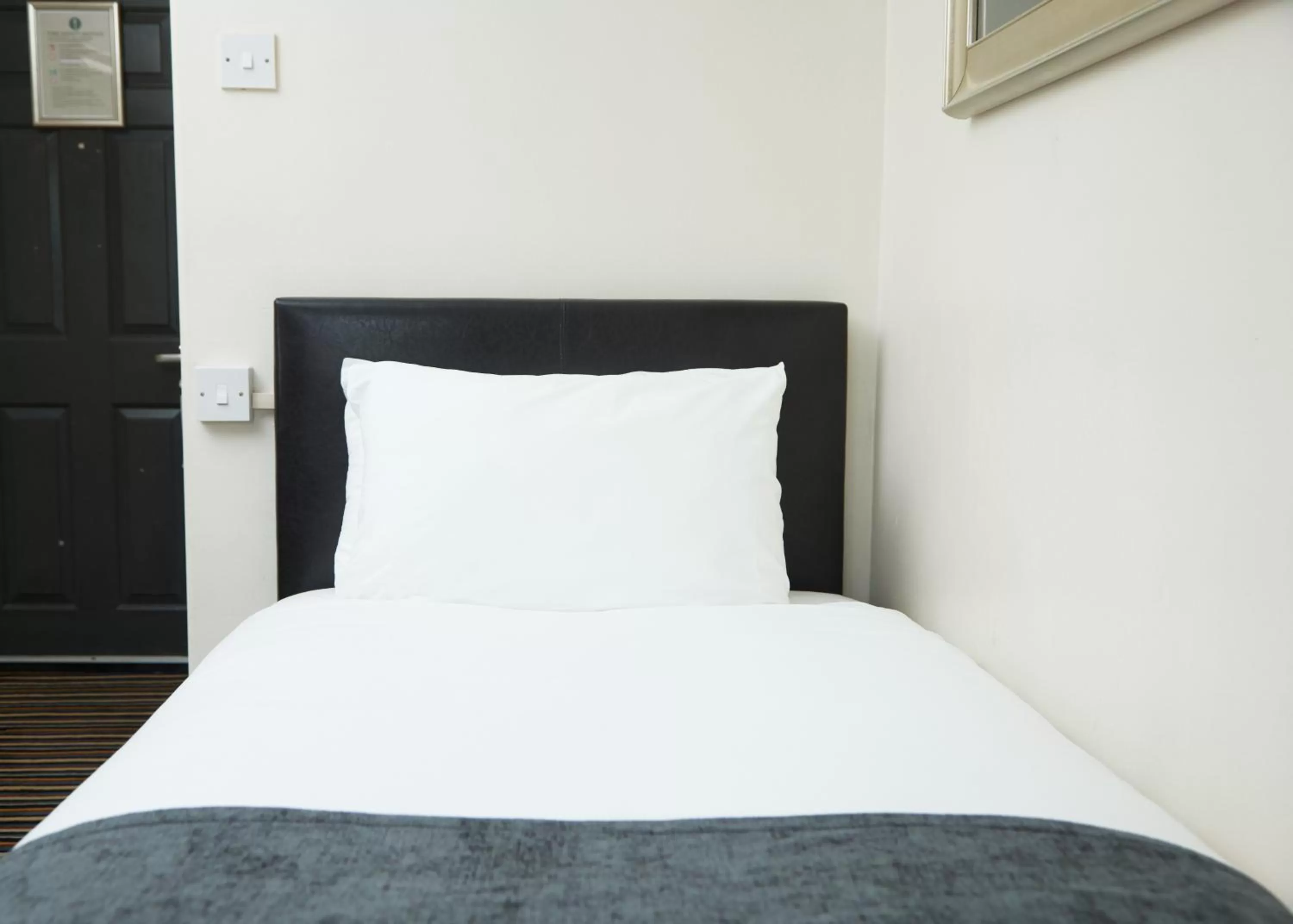 Bed in The Broughton Hotel by Greene King Inns