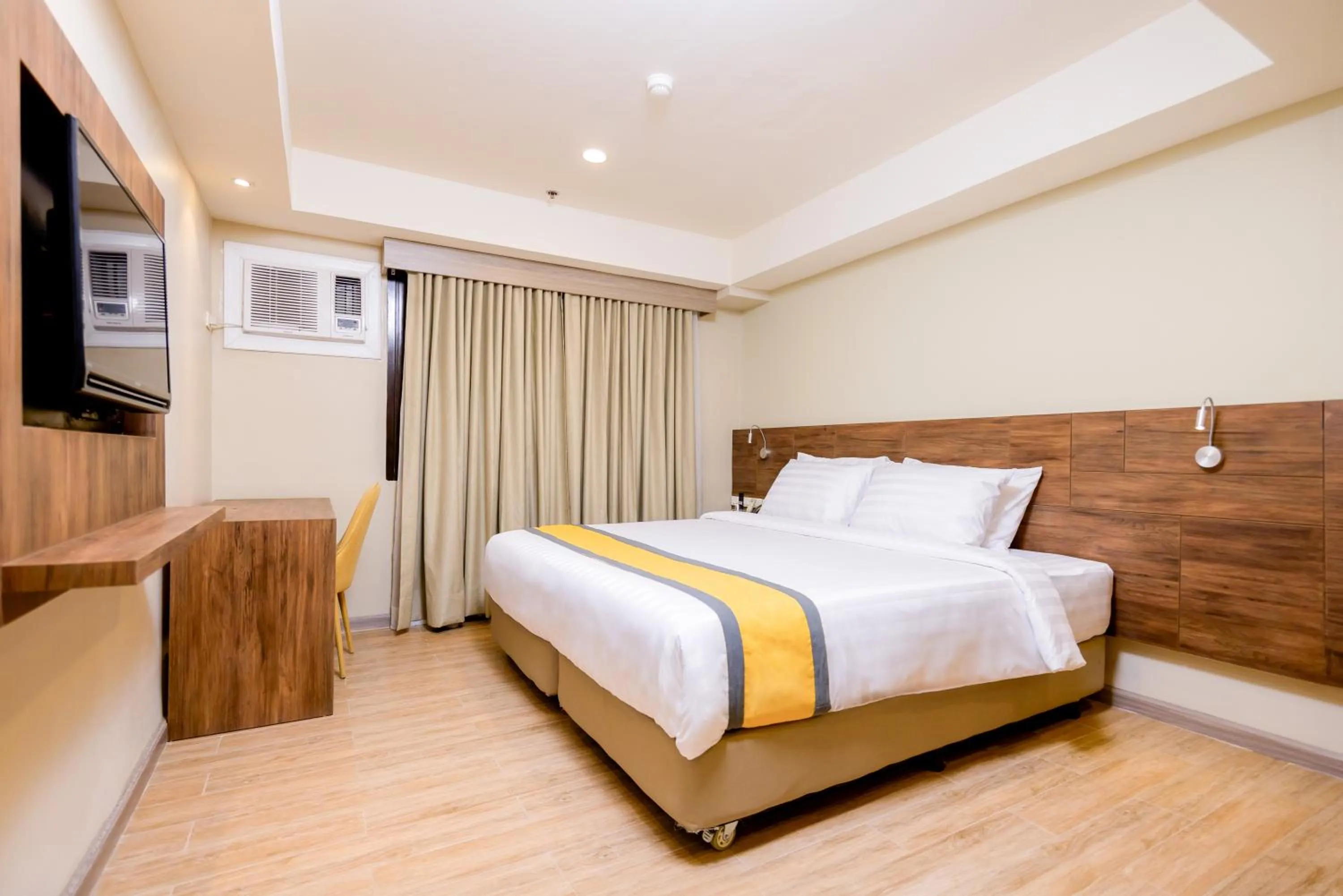 Bed in SureStay Plus by Best Western Cebu City