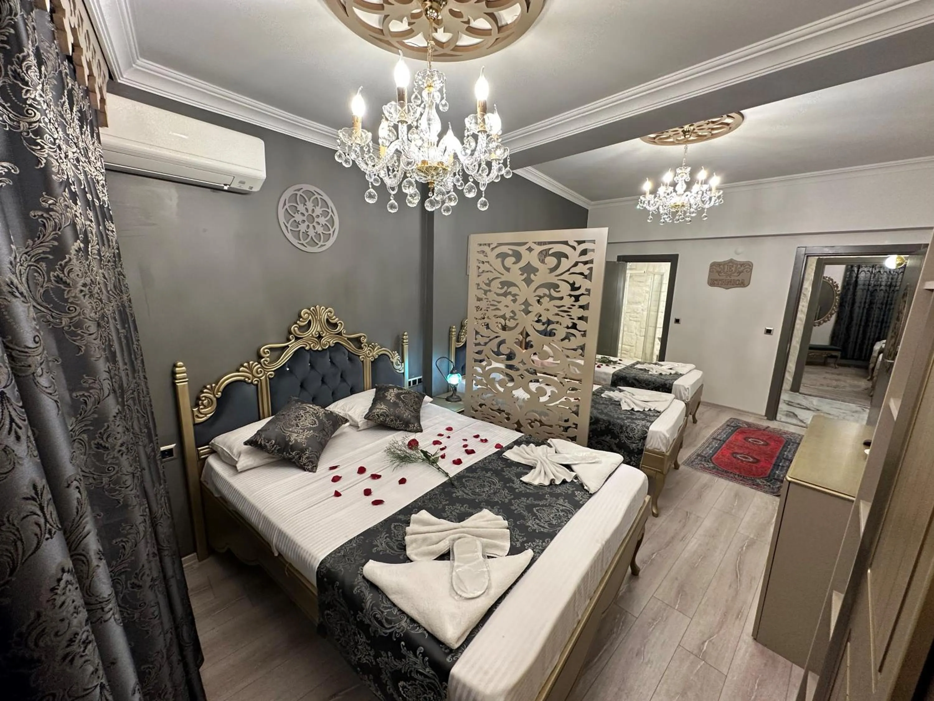 Bed in Ethnica Suites