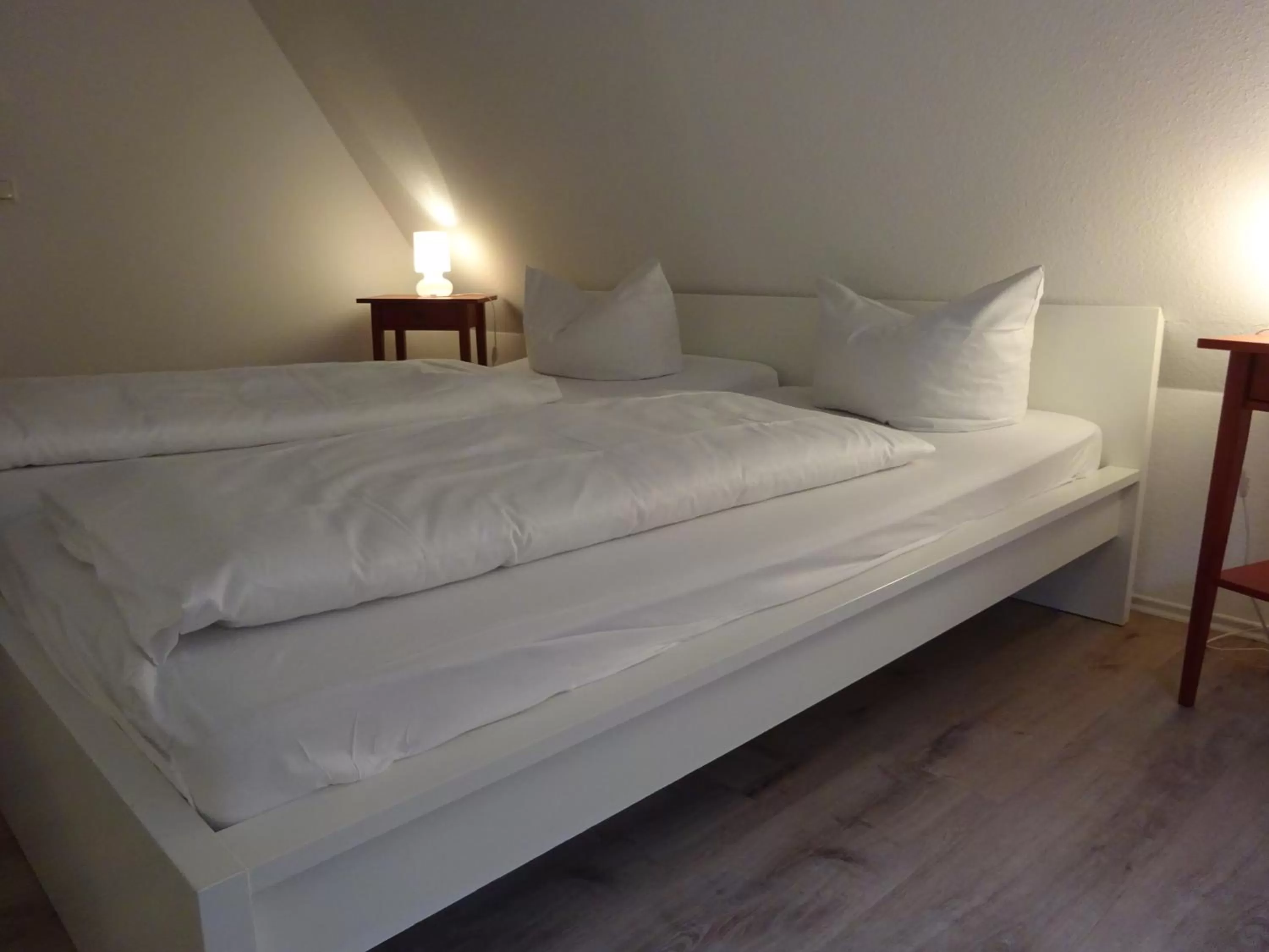Bed in Gästehaus Weingärtner
