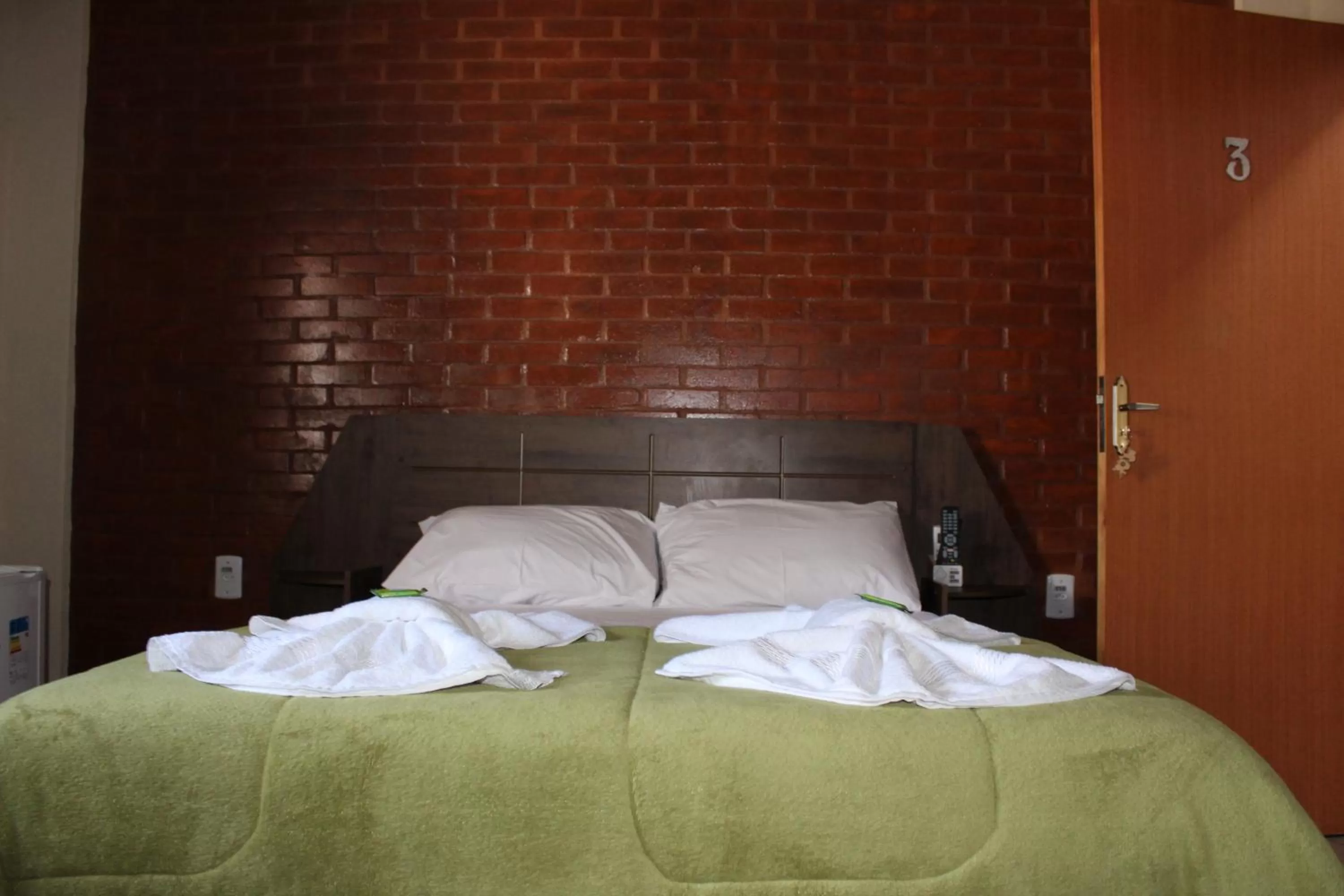 Bed in Pousada Morro dos Ventos