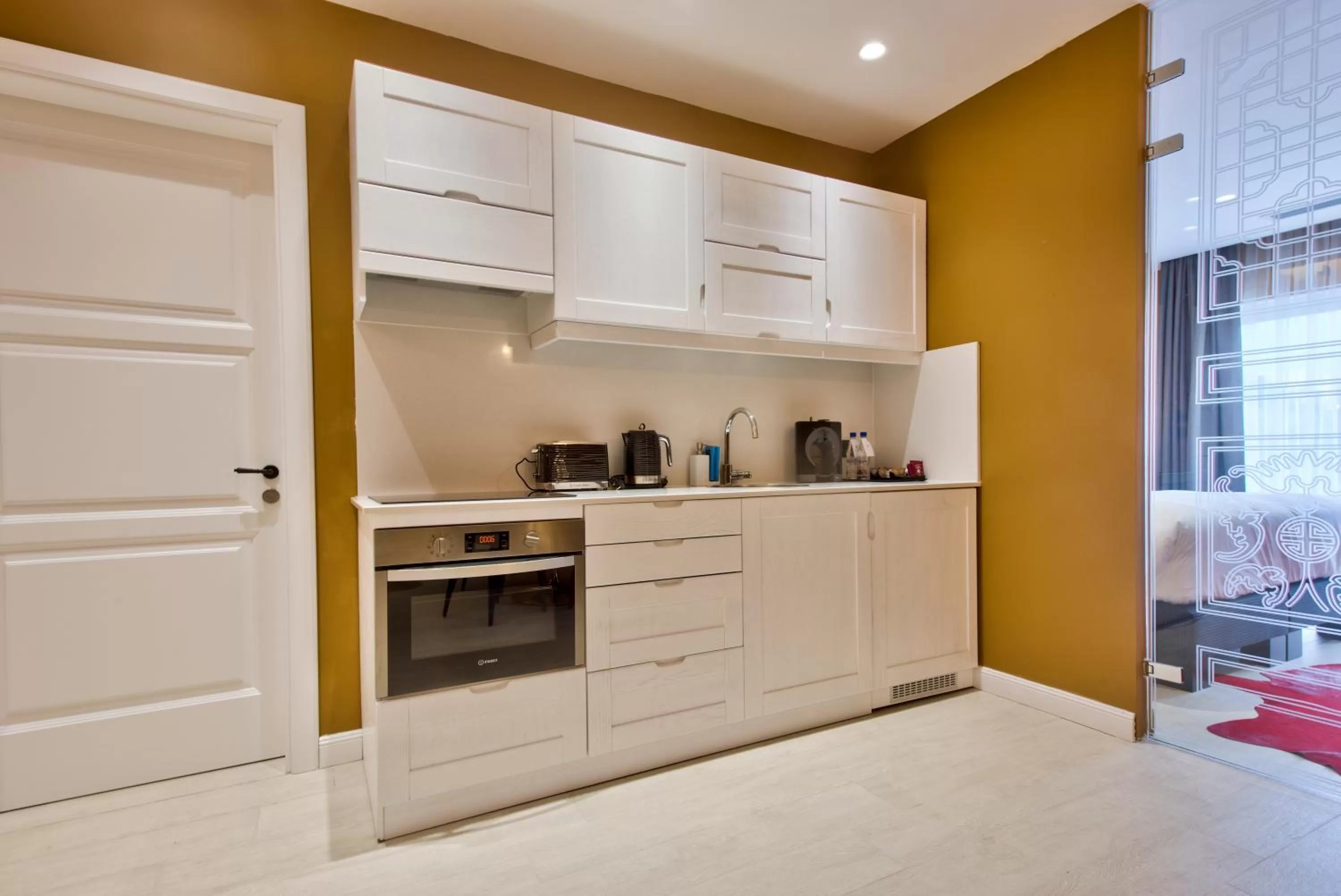 Kitchen or kitchenette in HOLM Boutique & SPA - IK Collection