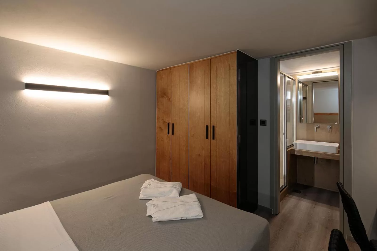 Bed in "Makava Suites" Your Luxe Urban Sanctuary