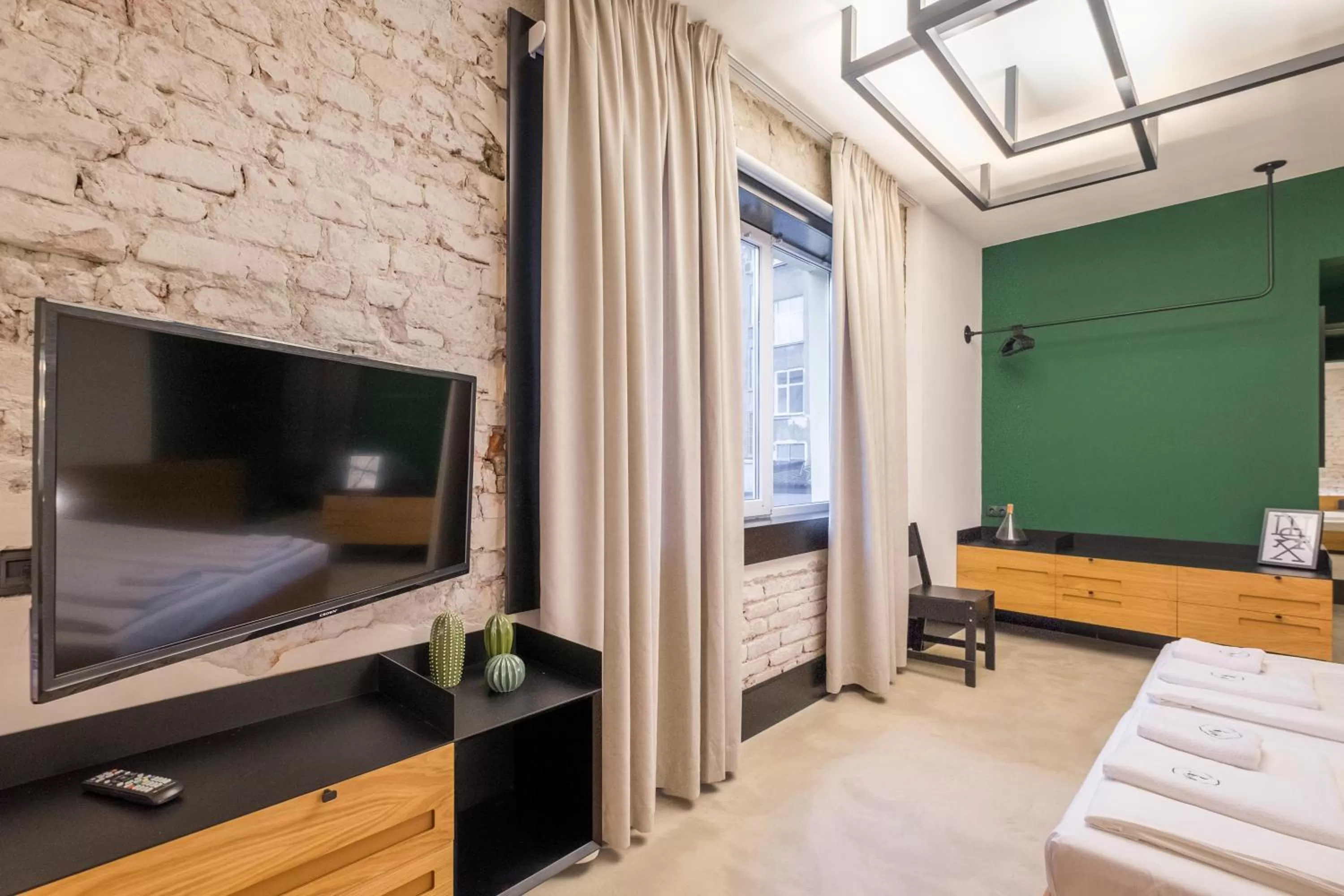 Bed in R34 Boutique Hotel