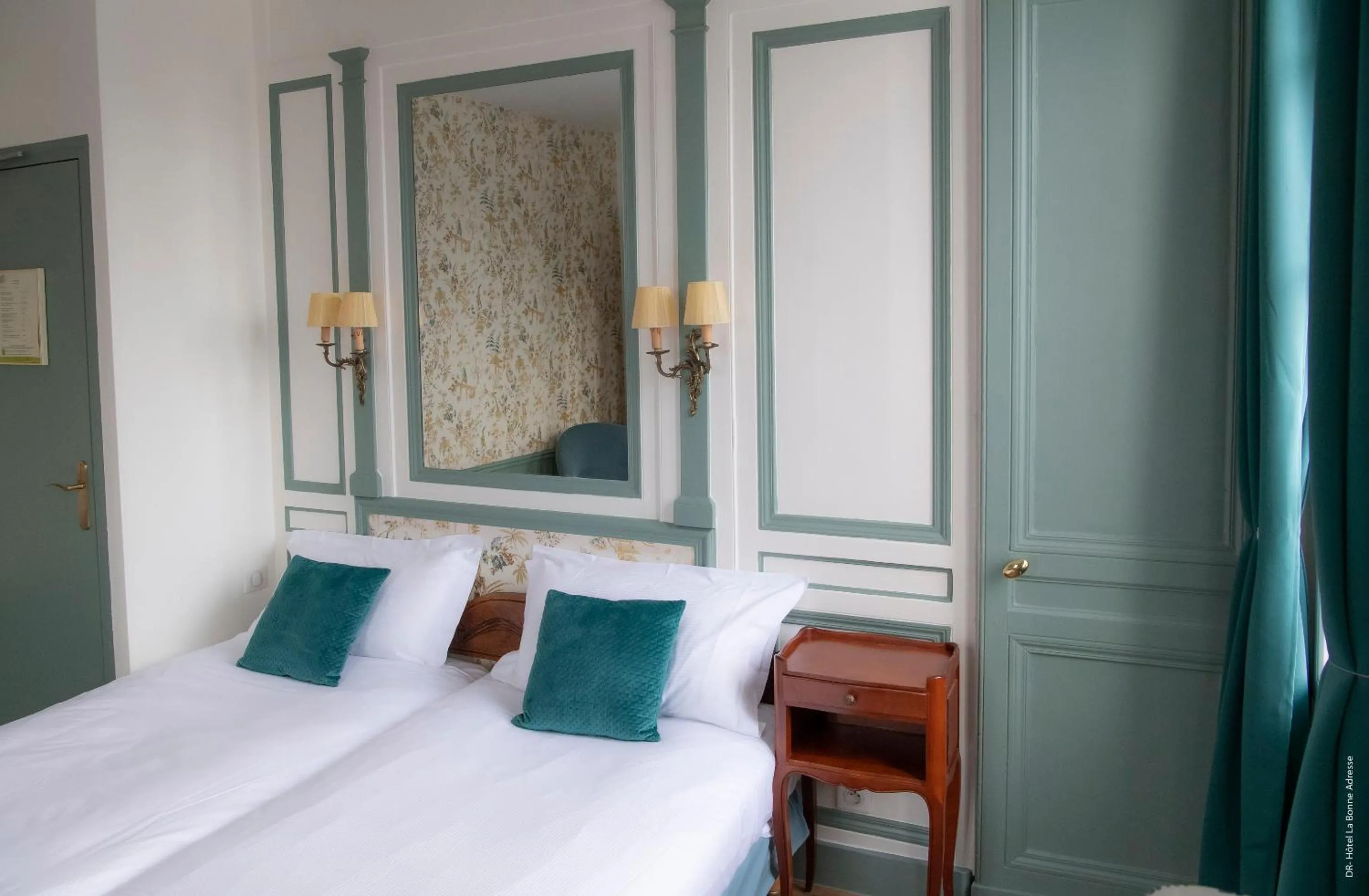 Bed in Hotel de Charme La Bonne Adresse - Logis hotels