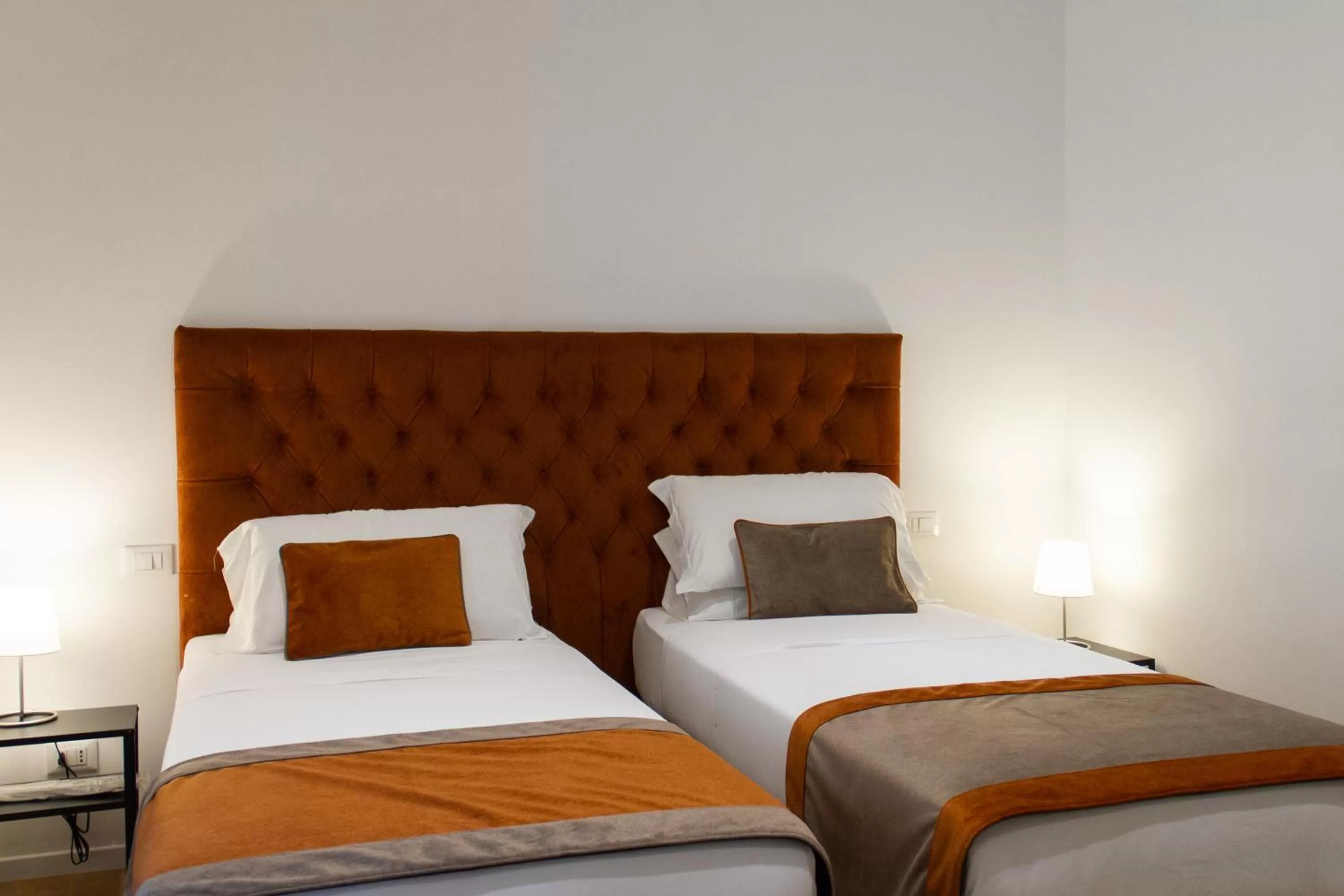 Bed in Michelangelo Vatican Rooms