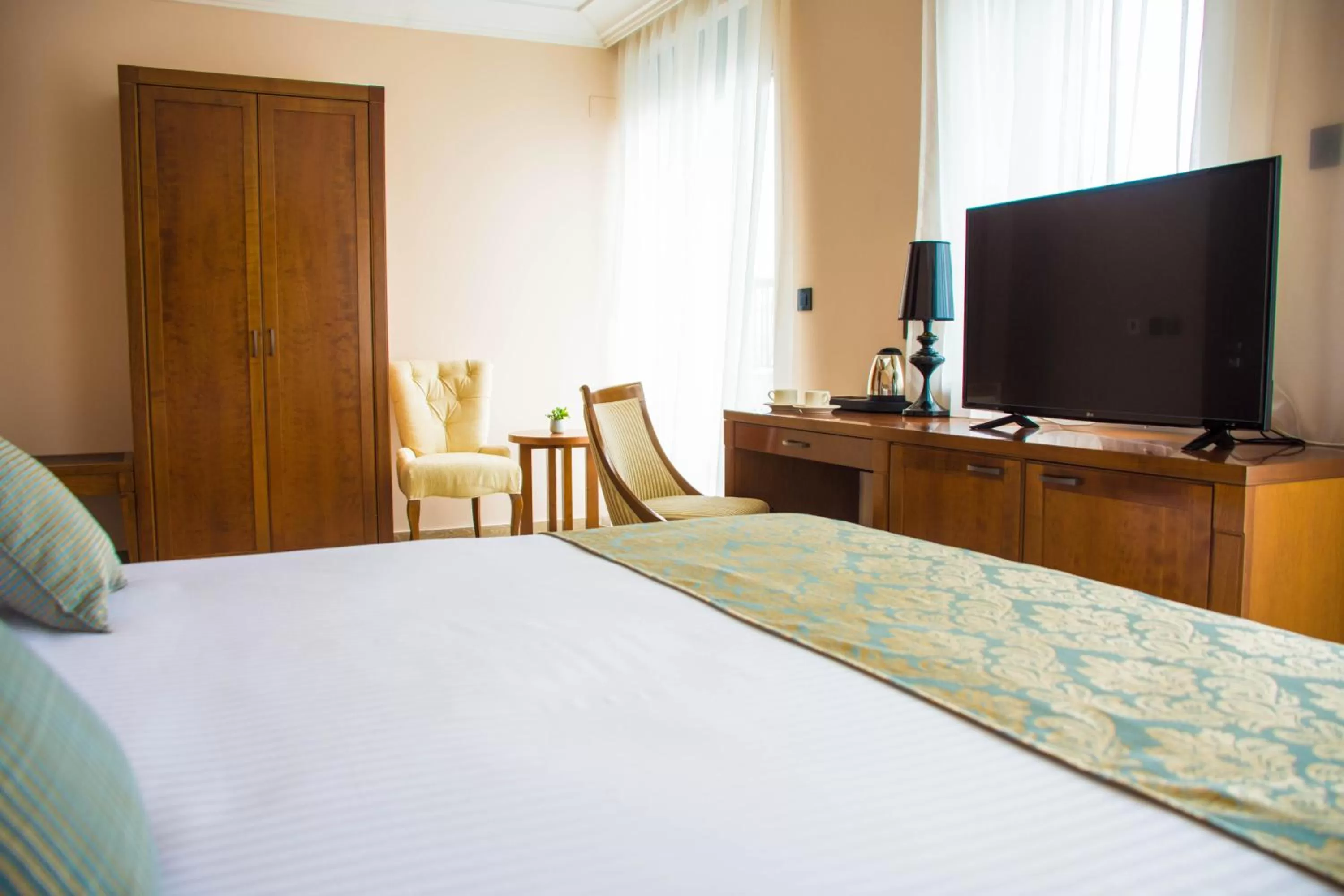 Bed in Xenon Hotel & SPA