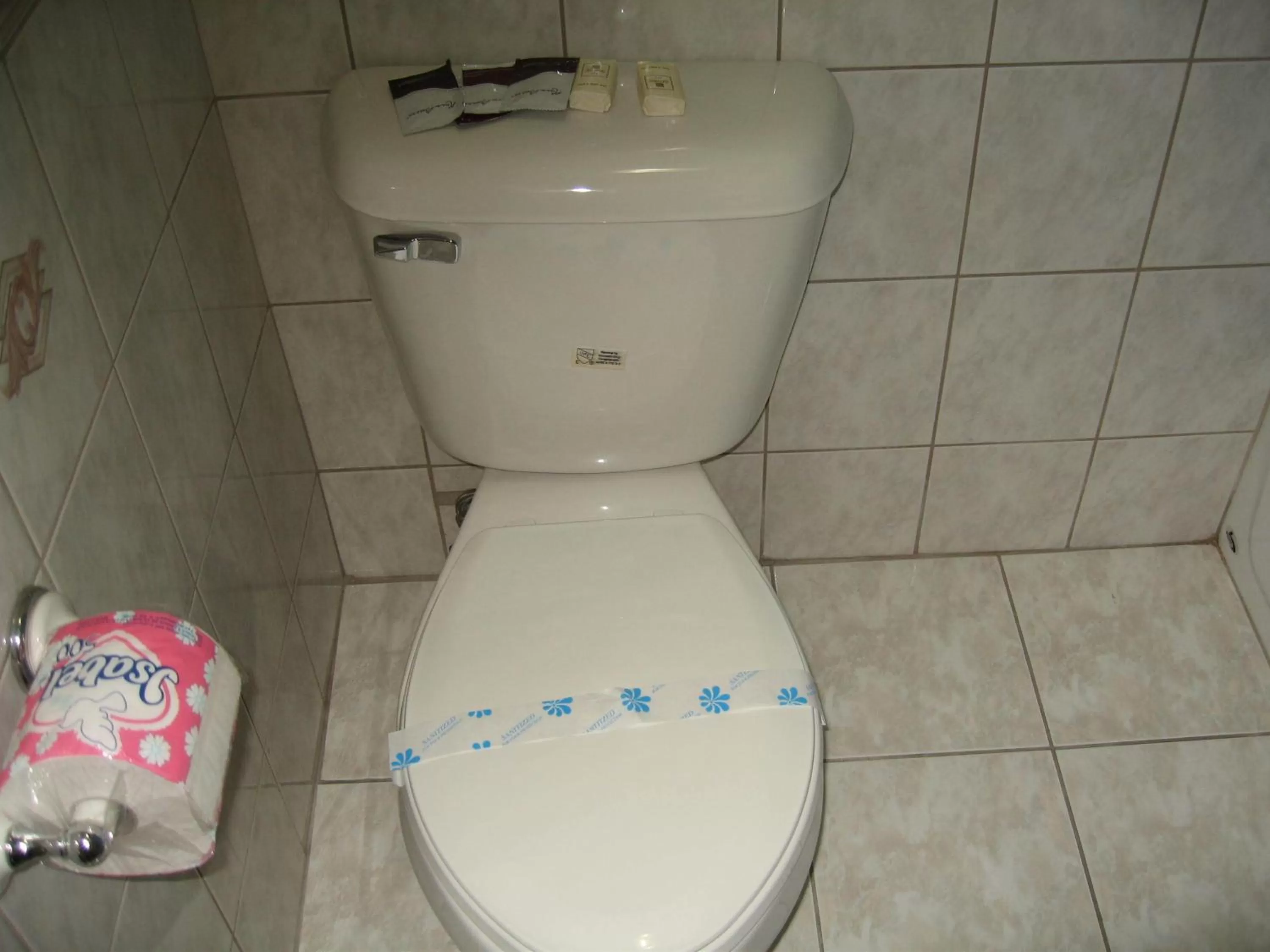 Toilet in Royal Inn Motel Long Beach